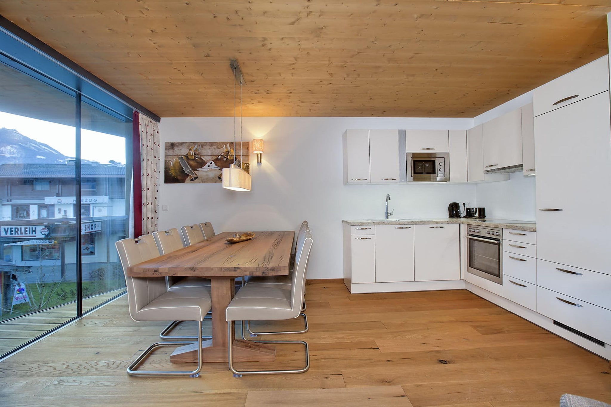 On the 1st floor: (bedroom(double bed), bedroom(double bed), bedroom(double bed), bathroom(shower, washbasin, toilet), bathroom(shower, washbasin, toilet), balcony, heating, garden, garden furniture)\n\nopen kitchen(oven, microwave, dishwasher, fridge-freezer), DVD player, parking