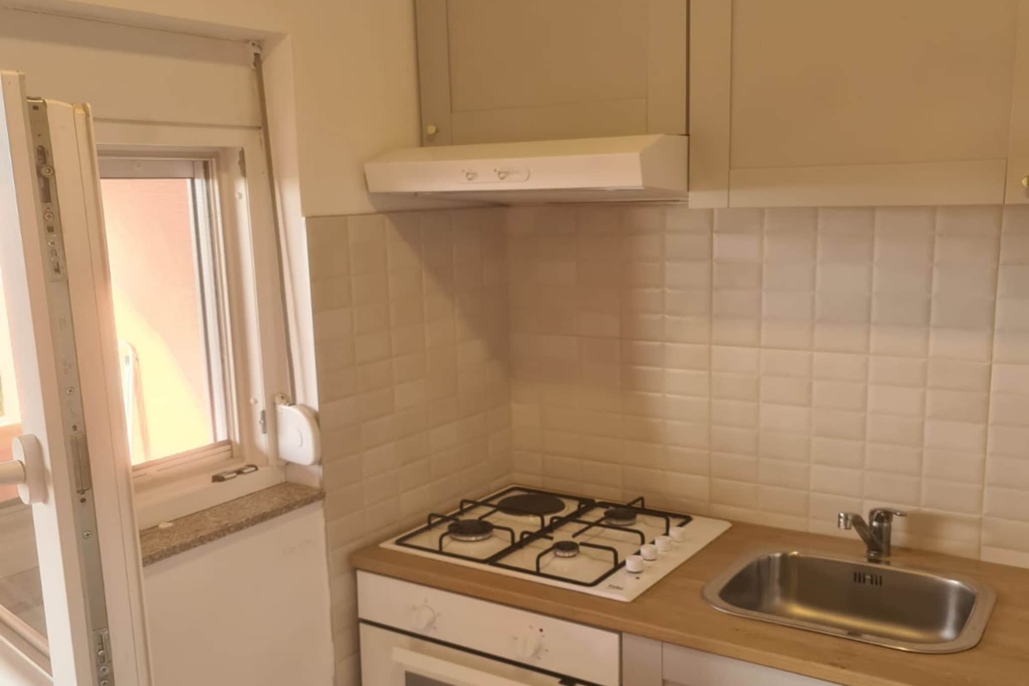 Apartments Rubbi - Two Bedroom Apartment with Terrace-Kitchen