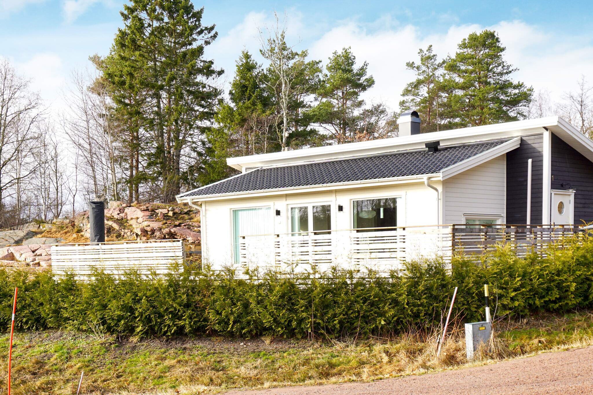 Welcome to this newly built, homely and family-friendly cottage with generous balcony areas. The accommodation has a very good standard and a perfect location for the sea and swimming, from the front of the cabin you can see a glimpse of the nearby mile-long Gullmarsfjord, Sweden's only threshold fjord. The cottage with its large, generous balcony areas is sunny and peaceful in a smaller cottage area bordering the sea, fields and meadows. Walk the few meters down to the nice swimming area, here there are jetties, rocks and sandy beach, a nice place to eat, swim, fish for crabs and hang out, the area is also known for its great diving opportunities in deep oxygen-rich underwater environments. The area has an active cottage association that carries out many pleasant activities during the summer period, in the immediate area there is a soccer field, boules court, tennis court, pay &amp; play golf course, mini golf and great opportunities for walking on coastal paths and roads. The accommodation is also a perfect starting point for exploring fishing villages, the archipelago, nature reserves and other interesting excursion destinations in central BohuslÃ¤n. From the car park you come to the cabin's entrance and further into the hall, which leads further into an open floor plan with a lovely view of the area. In the large bright open area you will find a well-equipped kitchen with stove, separate oven, microwave, fridge/freezer, coffee maker and dishwasher, dining area and living room with a warming wood stove, TV and a comfortable sofa group, three bedrooms, one with a double bed, one with a 105 x 200 single bed and one with a sofa bed. The bathroom has underfloor heating and is equipped with a shower as well as a washing machine and tumble dryer. The plot is child-friendly and generous, large garden with lawn, furnished balconies on both the front and back of the cottage where you can follow the sun's path in the sky, rest in the shade or bask in the sun in a sun lounger, enjoy good meals and pleasant conversations. The whole family will have a great time here! StÃ¥genisset with the main town of Lysekil, which is popularly known as &quot;The City by the Sea&quot;, is located at the far end of the sea band at the mouth of the Gullmarsfjord. Experience the fantastic feeling of freedom that the sea gives at StÃ¥ngehuvud's nature reserve with fine smooth red granite rocks that are unique in BohuslÃ¤n. During the summer season, many concerts with famous artists, sing-alongs in the park, etc. are offered. Several nice shops with a selection for different tastes. A pleasure for the children is to ride the small train around Lysekil, during the trip you also get a bit of history about Lysekil or why not walk through the older part of Lysekil from the 17th - 19th century. Cozy buildings along the narrow street towards Norra Hamnen, which in recent years has become a beach promenade. Here you can take a dip in the salty sea from the jetty and on a fine summer evening you can experience a fantastic sunset reflected in the sea. Feel free to rent a canoe and experience the beautiful archipelago along the smooth granite cliffs. For those interested in golf, the club can be swung on Holma's fine 18-hole course. Welcome to a homely cottage with a peaceful location by the sea and swimming!