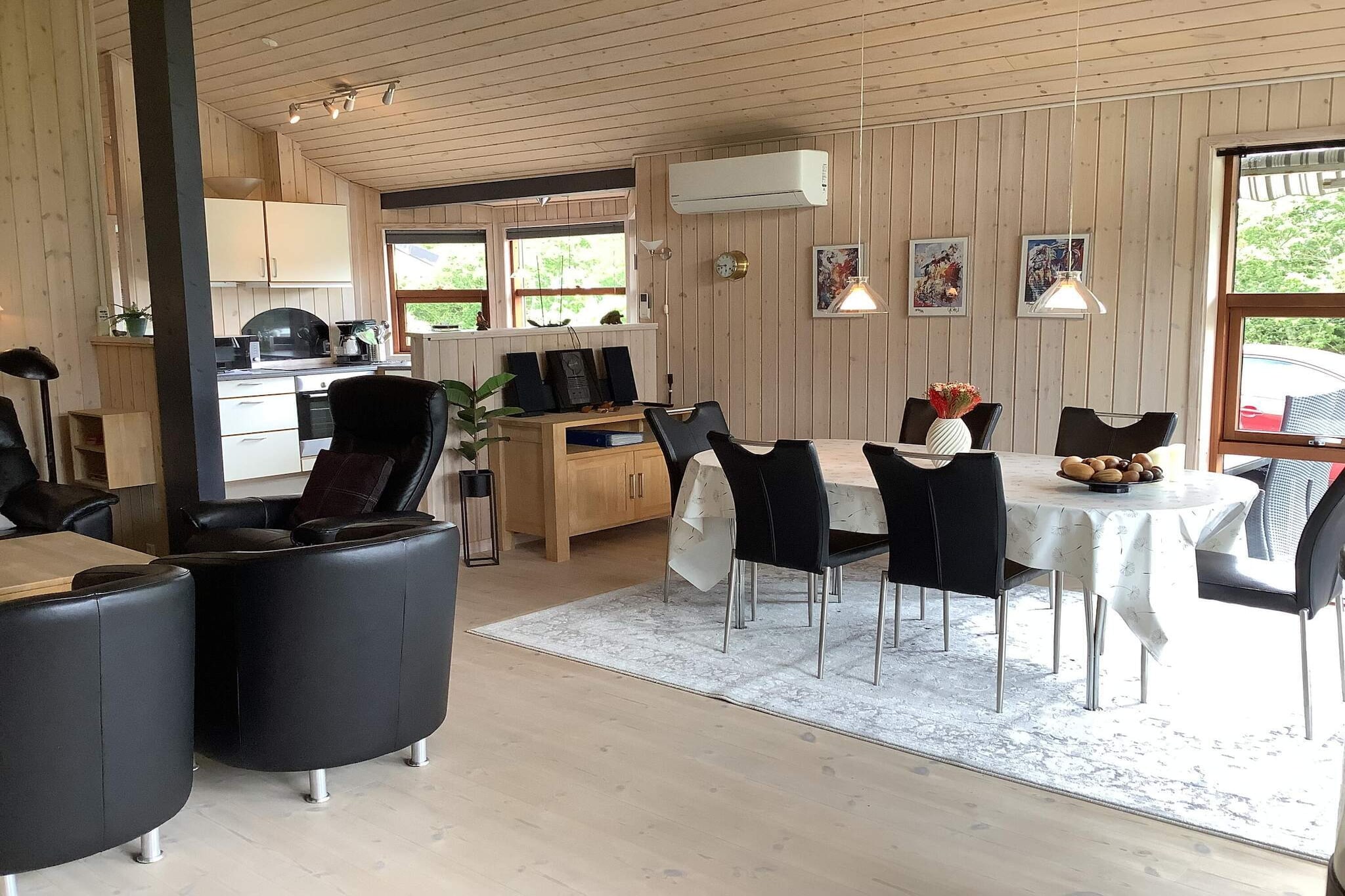 Kitchen(cooker(electric), coffee machine, microwave, dishwasher, fridge-freezer), Living/bed room(TV(german television channels, danish TV channels (DR1 and TV2)), CD player, stereo unit), bedroom(2x single bed, high chair), bedroom(2x single bed), bedroom(2x single bed), bathroom(washbasin, toilet), bathroom(stereo unit, washbasin, shower, toilet, washing machine), mezzanine(2x single folding bed), bath tub(outside, heated, 5 persons), Bubble bath(indoor, heated, 2 persons), sauna(indoor, 4 persons), heating(electric), terrace, garden furniture, sun loungers, air to air heatpump