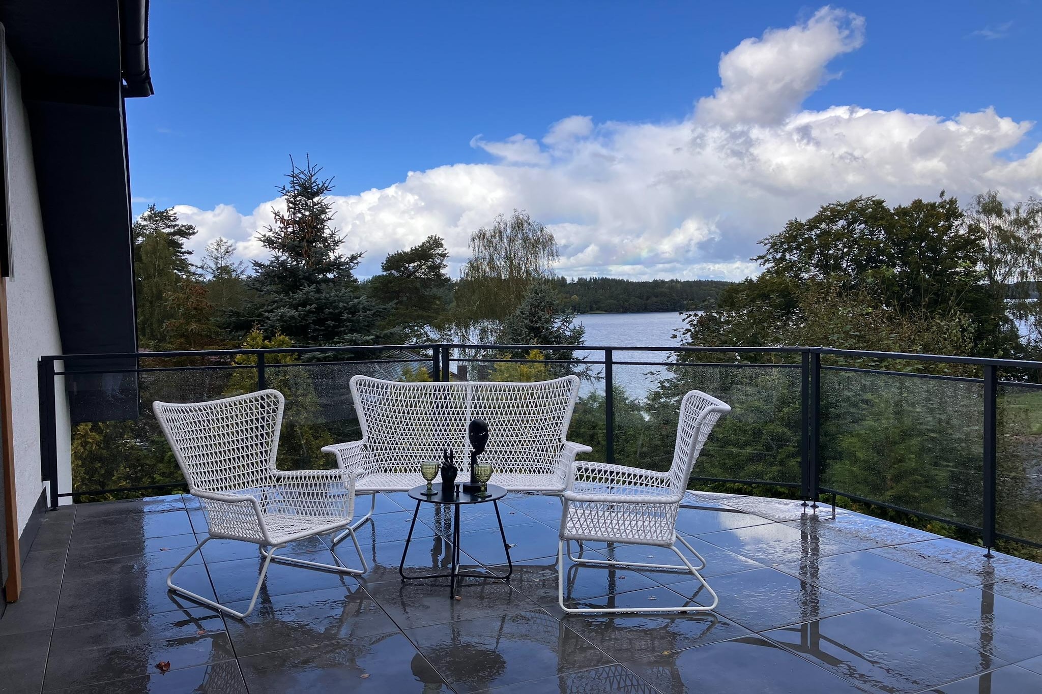 Escape to this spacious, modern, and stylish holiday apartment nestled on the third floor of a serene lakeside resort. Designed with comfort and relaxation in mind, this beautifully furnished retreat offers the perfect blend of convenience and charm. Step onto your private roof terrace and take in the panoramic views of Lake Raduńskie—one of the largest and most picturesque lakes in the heart of Kashubian Switzerland.
Inside, the apartment features a bright and welcoming interior, thoughtfully equipped with everything you need for a carefree stay—from a fully functional kitchen to cozy seating areas perfect for unwinding after a day of exploring. Whether you're sipping coffee with a view or enjoying a peaceful evening indoors, comfort surrounds you.
Perfectly located for adventurers and culture lovers alike, the apartment serves as an ideal base for discovering the natural beauty and rich traditions of the region. Explore scenic hiking and biking trails, charming Kashubian villages, or head to the nearby Baltic Sea and the historic city of Gdańsk—just a short drive away. Whether you're here for nature, culture, or a bit of both, this apartment promises a relaxing, memorable stay in one of Poland’s most enchanting regions.