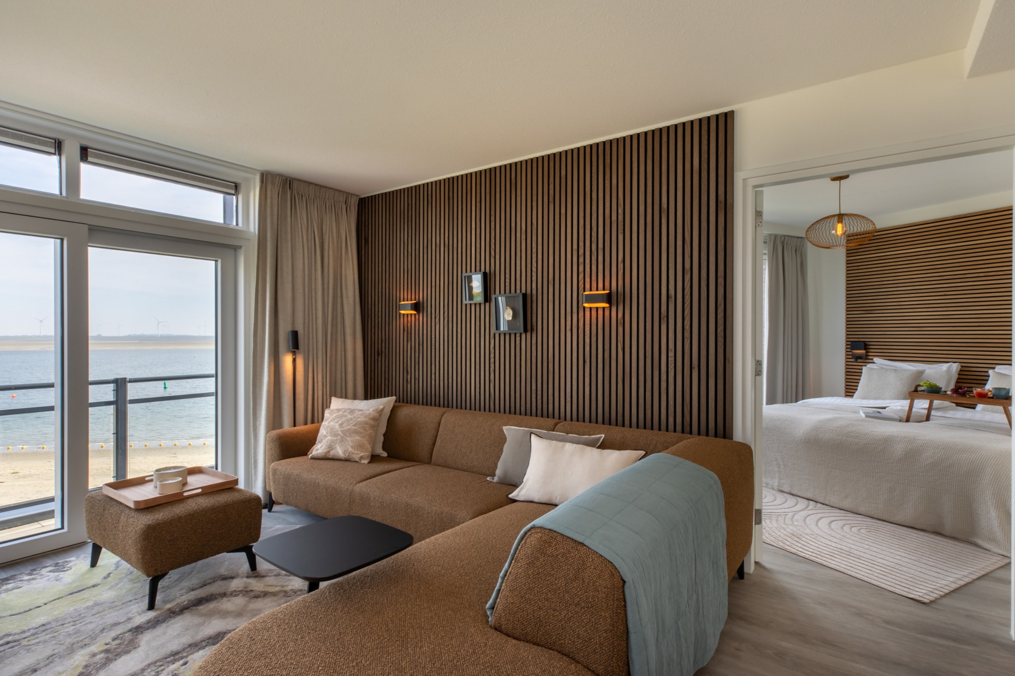 Welcome to your seaside sanctuary in Sint-Annaland, where relaxation meets breathtaking views in this charming first-floor apartment. Perfectly suited for up to 4 guests, this retreat offers an idyllic escape just steps from the sun-kissed beach. Upon entering, you're greeted by a cozy living room that beckons you to unwind after a day of seaside adventures. The adjoining kitchen is fully equipped, ready for preparing meals to be enjoyed at the dining table or al fresco on the balcony or terrace, where panoramic sea vistas await.
Located within walking distance of the pristine beach, you're invited to spend lazy days sunbathing on the sand, swimming in the clear waters, or taking leisurely strolls along the shore. Sint-Annaland itself offers a tranquil ambiance, ideal for those seeking a serene retreat. Discover local shops, charming cafes, and restaurants serving fresh seafood and regional delicacies. Nearby attractions include opportunities for boating, fishing, and exploring the scenic beauty of Tholen Island.
Two comfortable bedrooms provide peaceful repose, each designed with your comfort in mind. Wake up to the sound of waves and sunlight streaming through large windows that frame the azure sea. Whether you're seeking a romantic getaway or a family vacation, this apartment promises a memorable stay where every moment is enhanced by the beauty of the sea. Embrace the essence of coastal living and create cherished memories in this enchanting destination.