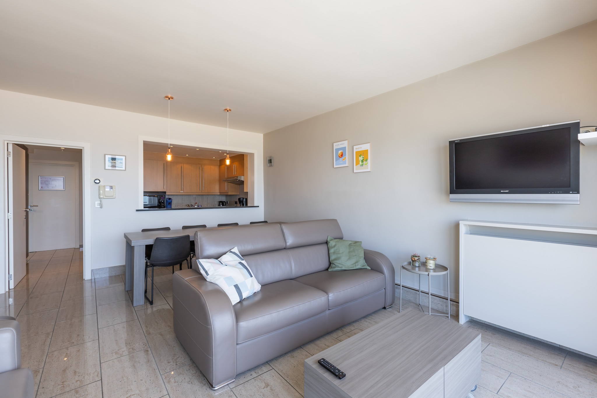 Ground floor: (Living room(double sofa bed(twin duvet, 160 x 200 cm), TV, dining table, seating area, radio, balcony), Kitchen(electric kettle, toaster, coffee machine, oven, microwave, dishwasher, fridge(+ freezer), Juicer), bedroom(double bed(twin duvet, 160 x 200 cm)), bedroom(bunk bed(duvet, 90 x 200 cm), bunk bed(duvet, 90 x 200 cm)), bathroom(shower, hairdryer), bathroom(bath tub, shower), toilet(guest toilet), Internet access, terrace, parking, lift, ironing board, iron)