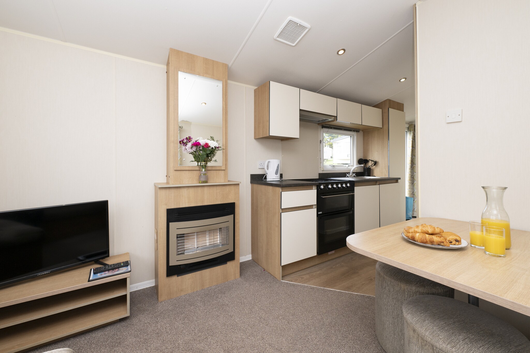 Facilities & Amenities
Tencreek Holiday Park by Belvilla is a smoke-free campsite offering an indoor pool, a restaurant, and a bar/lounge for guests to relax. The site provides free WiFi in public areas and complimentary self-parking. Families will enjoy the complimentary childrenâ€™s club, an on-site coffee shop, and an outdoor tennis court, ensuring plenty of activities for all ages.

Comfortable Accommodation
All accommodations are individually decorated and include WiFi and private showers. Guests can unwind by the cozy fireplaces, while kitchens come equipped with fridges and ovens for convenience. Limited housekeeping is available to maintain a comfortable stay.

Important Policies & Info
The property features carbon monoxide and smoke detectors for safety. Please note the park does not accept bookings for group events or parties, including stag and hen gatherings. Additional charges may apply for extra guests depending on property rules. Multilingual staff speak Croatian, Danish, Dutch, English, French, German, Italian, Norwegian, Polish, Spanish, and Swedish to assist visitors.