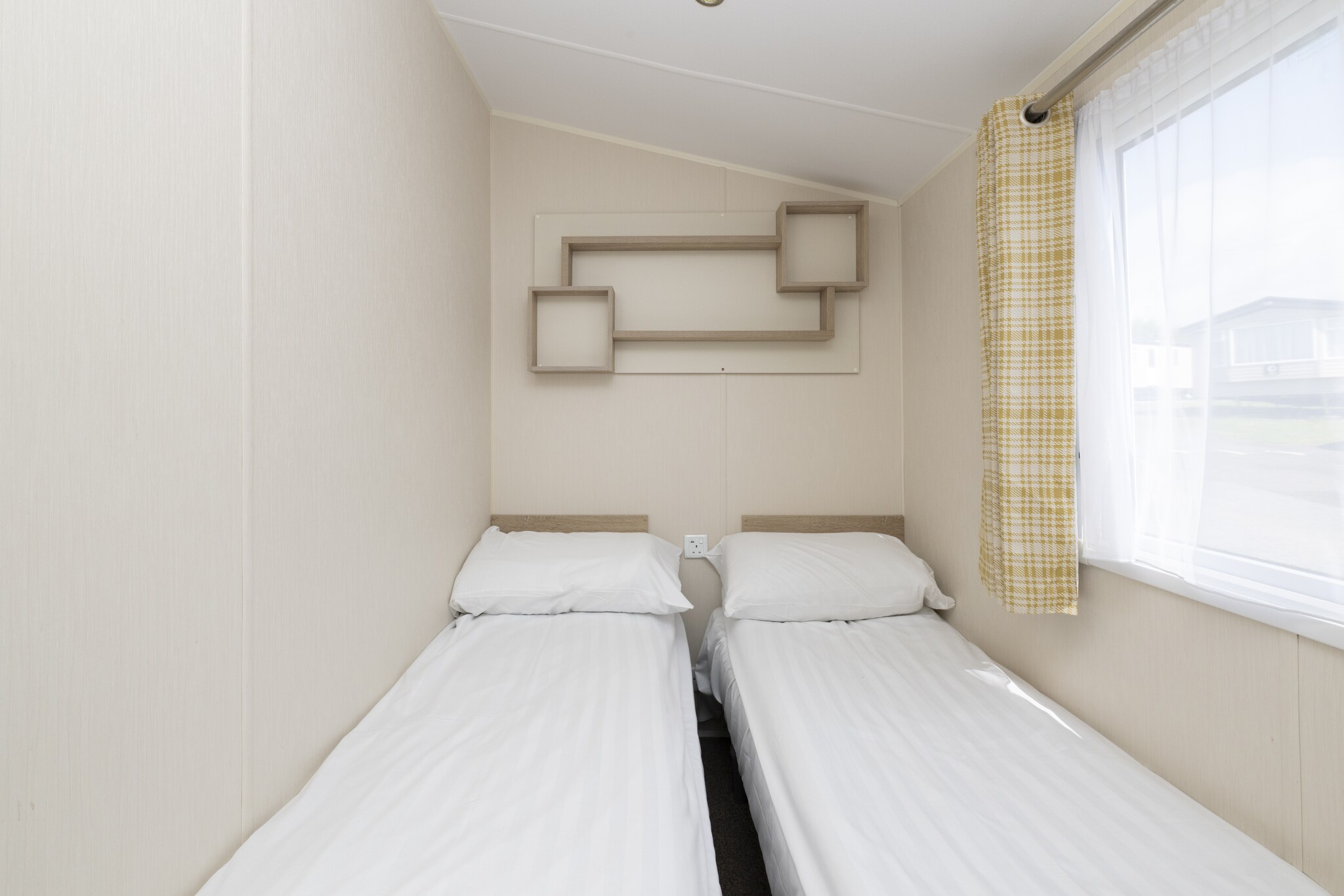 open kitchen(stove, electric kettle, toaster, oven, microwave, fridge, dishes and cutlery(Bowls, chopsticks, plates, cups, etc.)), Living/diningroom(double sofa bed, TV(smart TV), dining table), bedroom(double bed, Sheets incl., Towels/Sheets (Incl.)), bedroom(single bed, single bed, ironing board, iron), bedroom(single bed, single bed), bathroom(shower, washbasin, toilet, hairdryer), parking, hot water, heating