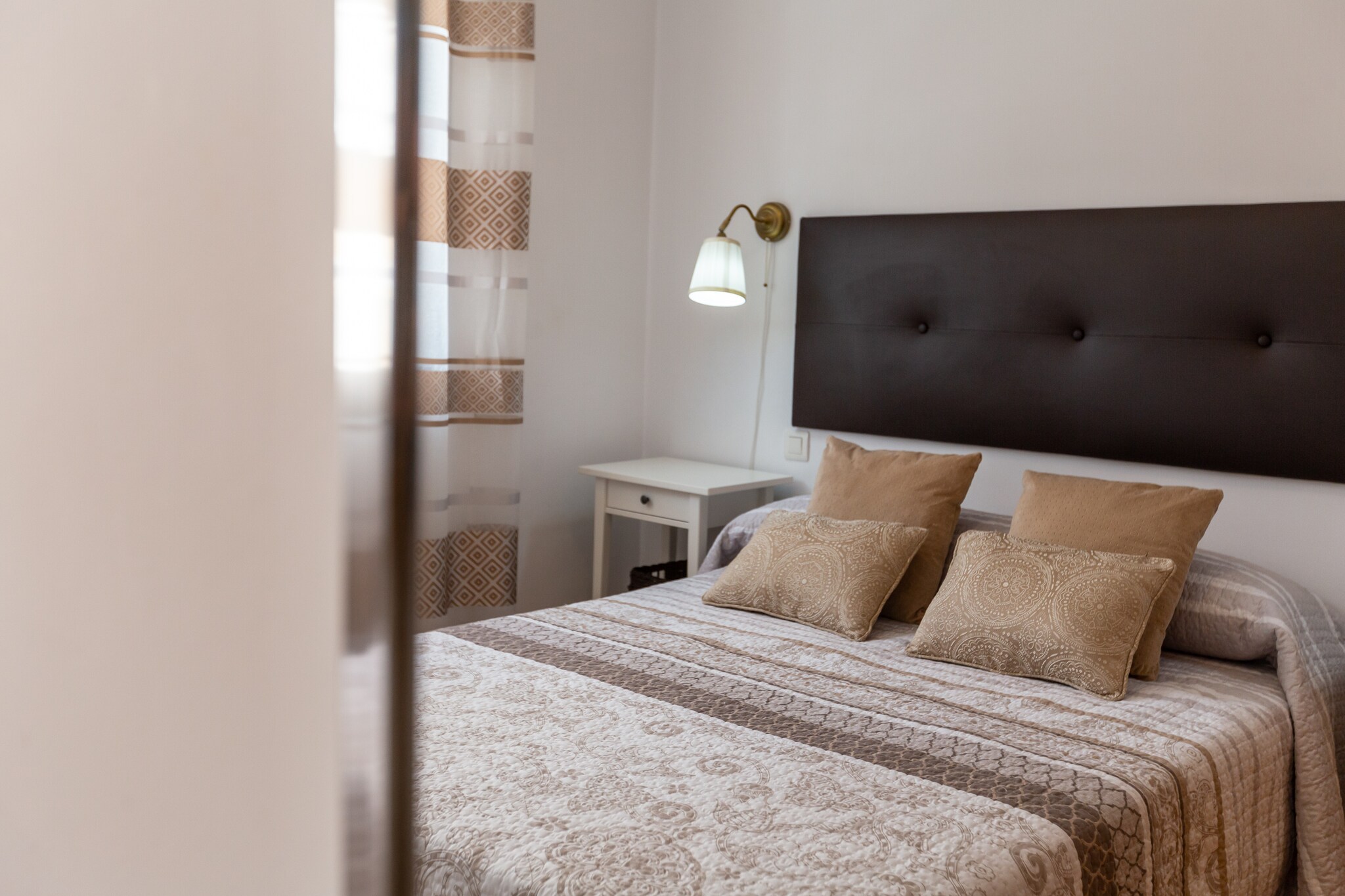 If you are looking forward to discover the south of Spain, this is the perfect accommodation for you. Located in an area close to the mountains, the apartment has large windows that make the rooms bright and also offer unobstructed views of the surrounding forest. Please note that, being located in a block of apartments, the apartment has direct neighbors.

Located on the first floor of a building with a lift, the cosy interior is designed to offer you the rest you deserve. The spacious living-dining room, equipped with AC and Smart TV, will become the ideal place to extend your evenings. The kitchen, open to the living room, has a ceramic hob and all the necessary utensils for you to cook comfortably. The house has a washing machine, iron and ironing board. When it's time to sleep, there is a double bedroom with AC. Up to 2 people can sleep on the sofa bed in the living room. There is also a separate bathroom with shower. If you are travelling with your baby, we can provide you with a cot and a highchair.

This apartment is located in Tolox, a village in Malaga known for its hot springs spa, as well as for its natural beauty and traditional architecture. Here you will find all the necessary services to enjoy an independent stay, as well as a multitude of leisure offers. We invite you to explore its historic center of narrow cobblestone streets, white houses with flowers in their windows and beautiful squares with fountains. You can also visit one of the many restaurants where you can enjoy the wide gastronomic offer of the town, specialized in typical dishes of Andalusian cuisine. Nature lovers can enjoy hiking the trails that run through the nearby mountains and forests or strolling through the Natural Park of the Sierras de las Nieves, a protected natural area near the village that has a wide variety of flora and fauna, as well as stunning mountain scenery. In short, Tolox is an ideal place for those looking for a quiet getaway in contact with nature, where you can do outdoor activities and enjoy the gastronomy and cultural heritage of the region. Consult the advertiser for possible charges. Pets are not allowed. The holding of events is forbidden. 
Distances
Beach: 56.1 km - Playa de Canuela
Airport: 49.1 km - Málaga - Costa del Sol
Golf course: 19.6 km - Golf Breaks in Spain
Town: 0.077 km - Tolox
Train station: 19.7 km - Coín
Bus stop: 0.15 km - Tolox
Ferry: 45.7 km - Fuengirola
Hospital: 30.8 km - Hospital Valle del Guadalhorce
Tourist license: VUT/MA/23572