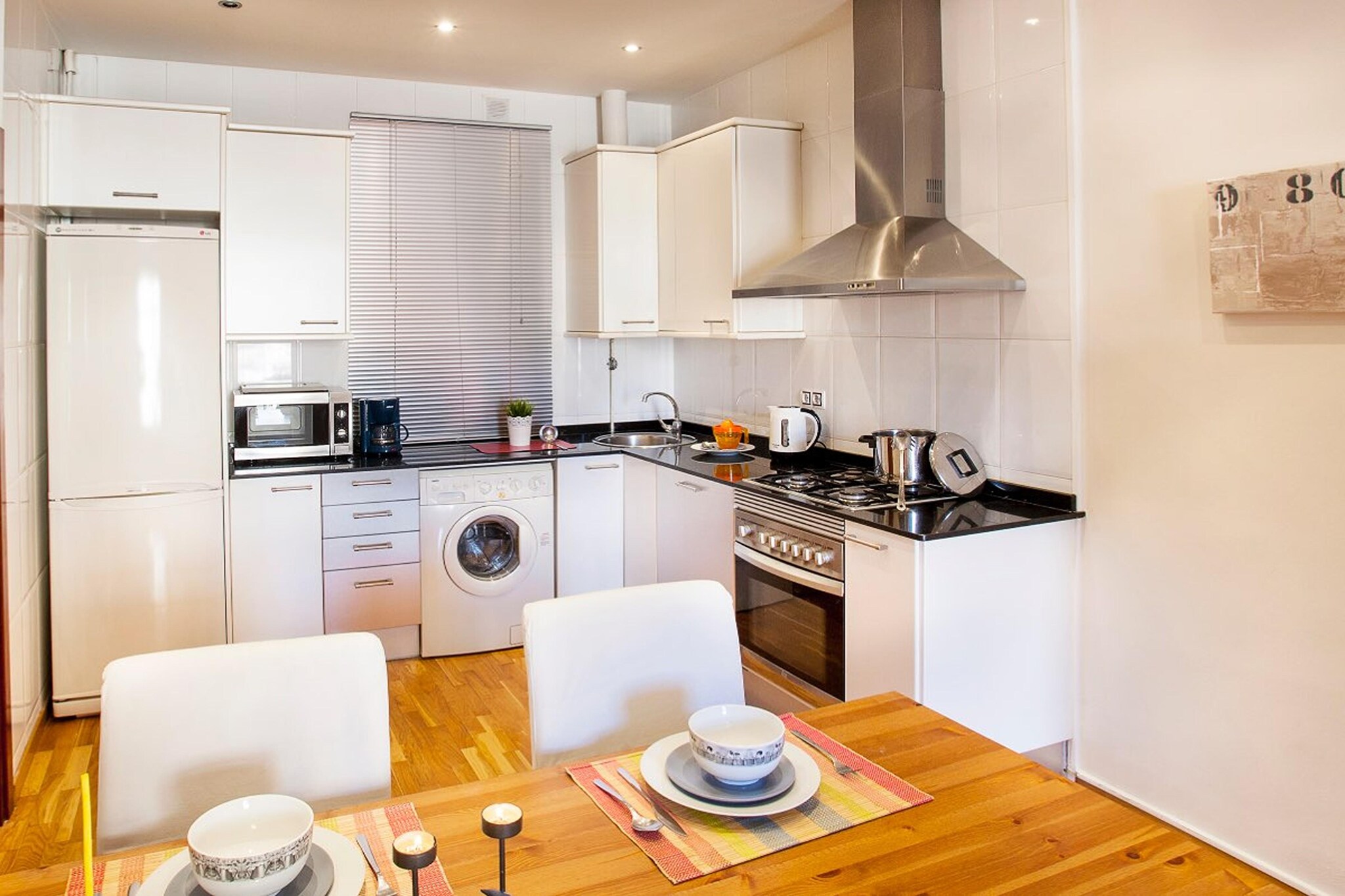 Experience luxury living in the heart of Barcelona with this exquisite premium apartment, perfectly situated near the vibrant seabeach. This stylish and contemporary apartment is an ideal retreat for couples, offering a seamless blend of comfort and sophistication. Step inside to discover an open and airy living space, featuring a modern open kitchen equipped with top-of-the-line appliances. Prepare delicious meals or indulge in Spanish delicacies with ease. 

 Located near the seabeach, this apartment offers easy access to Barcelona's beautiful coastline, where you can stroll along sandy shores, soak up the sun, or indulge in water activities. Immerse yourself in the vibrant atmosphere of the city, with its bustling streets, charming cafes, and iconic landmarks just a short distance away. 

This flat has a balcony to the outside which is accessed from the living room and from one of the bedrooms. It has two bedrooms, a living-dining room integrated with the kitchen and a complete bathroom. One of the bedrooms has a double bed, a large wardrobe, a chest of drawers and shelves. The second bedroom has two single beds and a second wardrobe. Full bathroom with shower. The flat is equipped with heating and air-conditioning, TV, WIFI internet access, washing machine, etc. In the dining room there is a sofa table for up to four people, and it forms a whole with the kitchen, which is fully equipped with the necessary kitchenware for the people staying according to the details in the reservation.