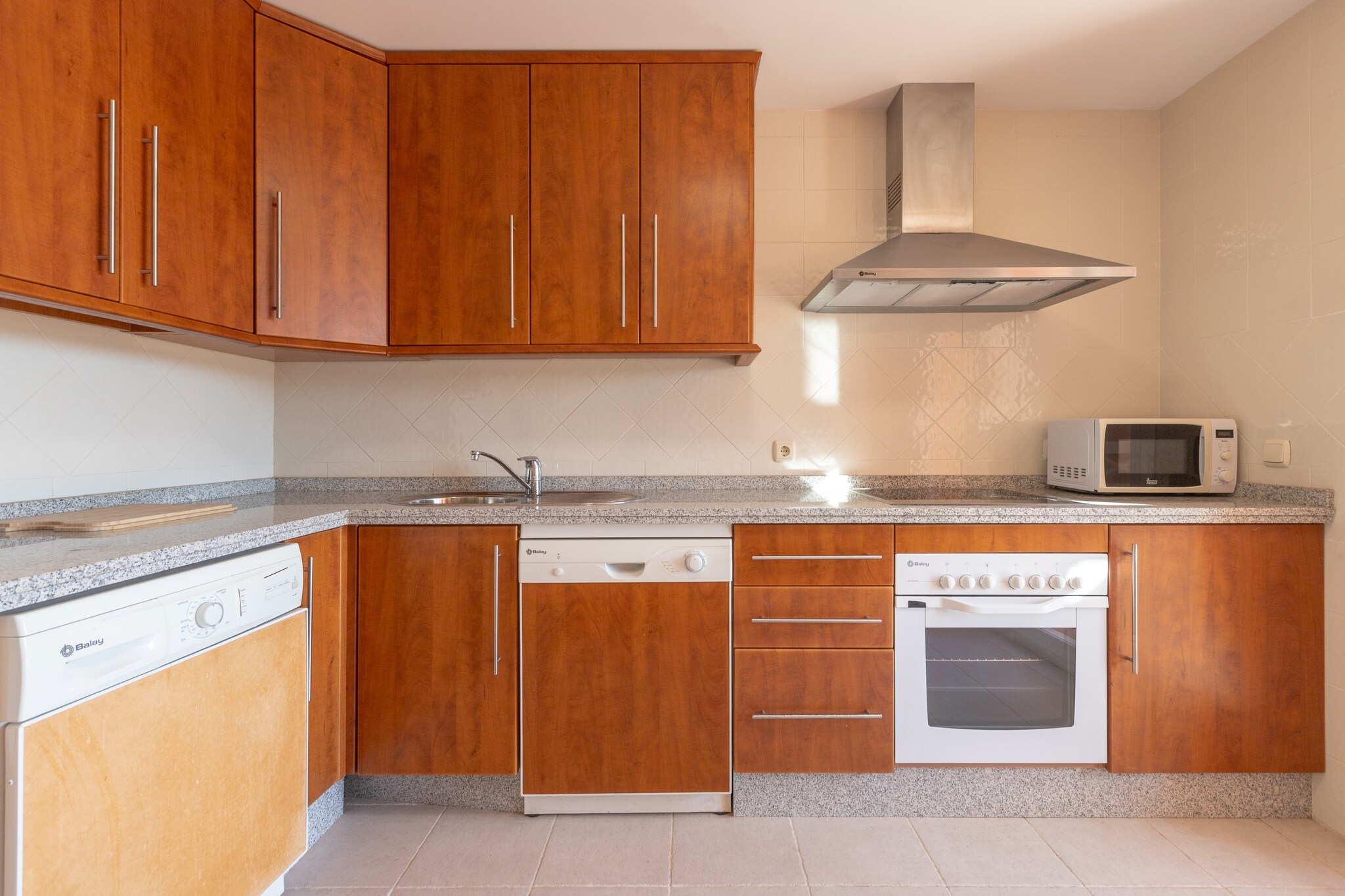 Living room, dining room, Kitchen(cooker, oven), bedroom(double bed), bedroom(double bed), bathroom, bathroom, garage, coffee machine, microwave, dishwasher, fridge-freezer, bath tub, bath tub, washbasin, washbasin, toilet, toilet, bidet, bidet, air conditioning, air conditioning, swimming pool, lift, children\'s bed, high chair