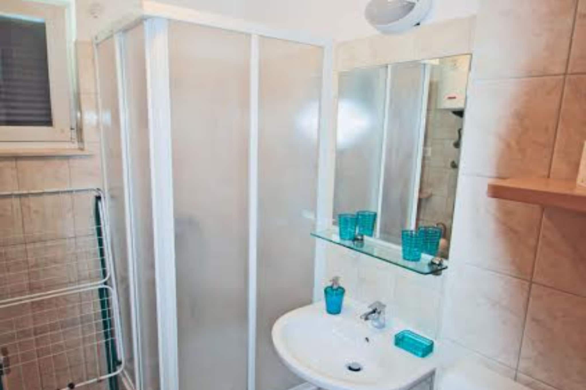 Beachfront Apartments Tamarix - Superior One Bedroom Apartment (Grand) 5-Badezimmer