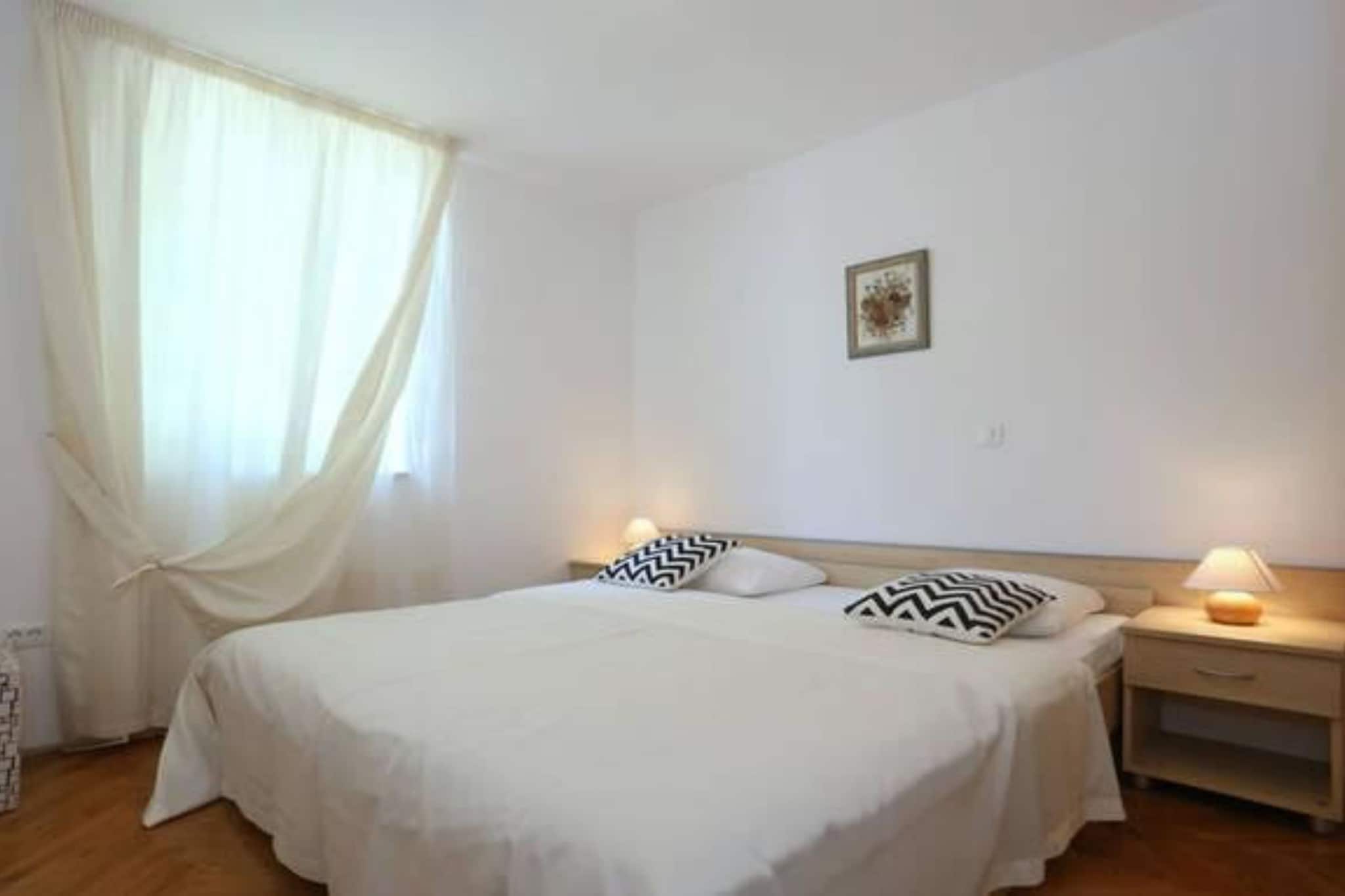 Beachfront Apartments Tamarix - One Bedroom Apartment with Partial Sea View-Bedroom