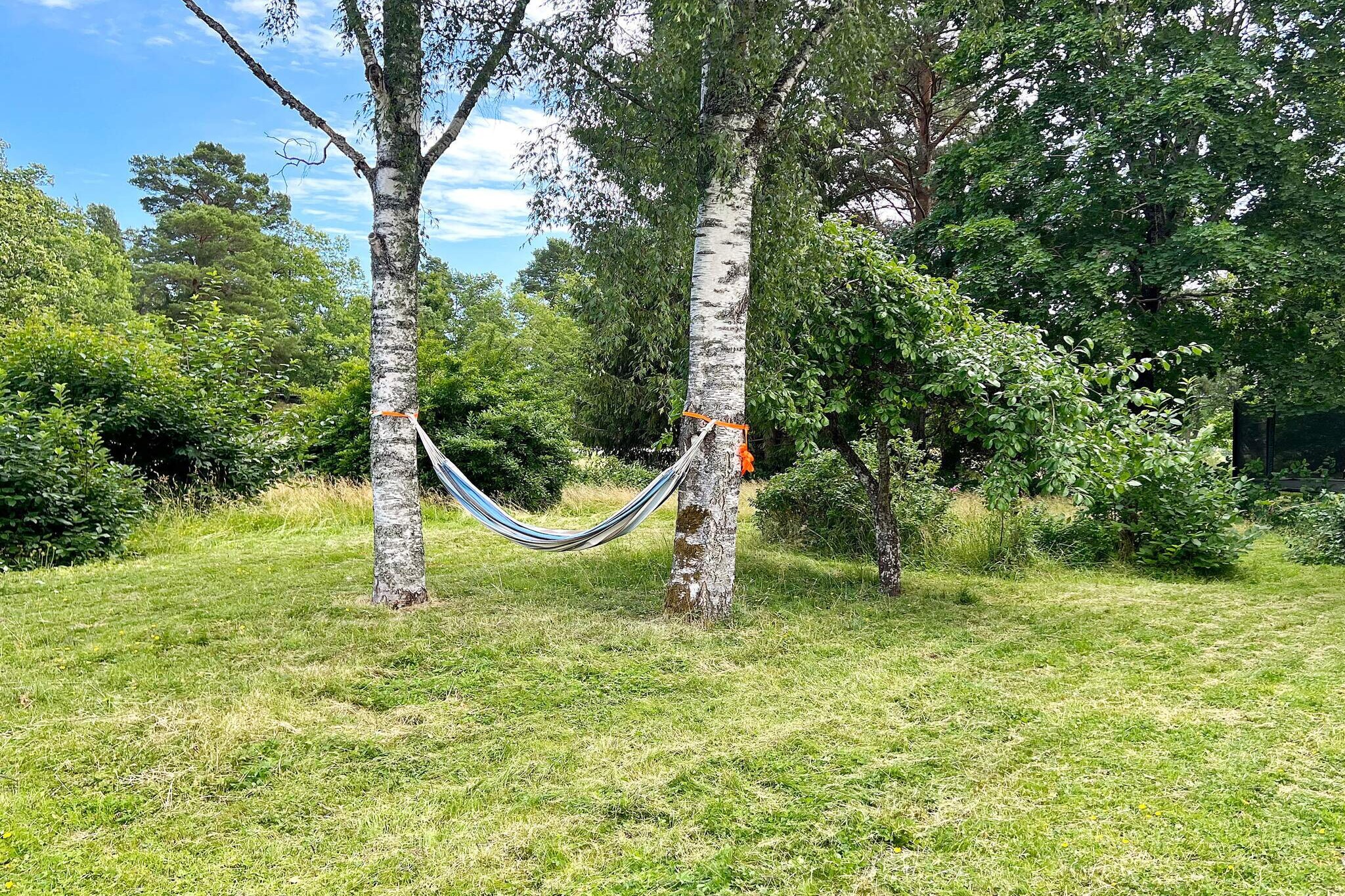 Annex: (single bed, 3x bunk bed, washbasin, shower, toilet, washing machine)\n\nKitchen(cooker(electric), hood, coffee machine, microwave, dishwasher, fridge-freezer, water from well), Living/bed room(chromecast), bedroom(double bed), bedroom(2x bunk bed), bathroom(floor heating)(washbasin, shower, toilet), garden, garden furniture, parking, geothermal energy, air to air heatpump