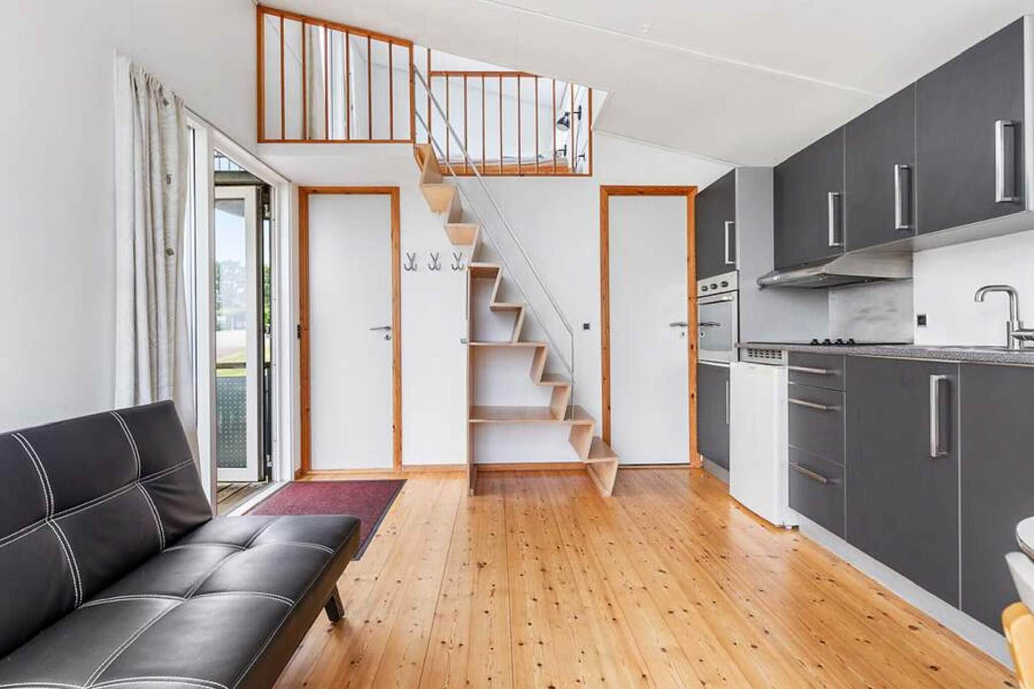 Kitchen(coffee machine, oven(mini), microwave, fridge, fridge-freezer), Living/bed room(TV(danish TV channels (DR1 and TV2))), bedroom(4x single bed), bathroom(washbasin, shower, toilet), heating(central), BBQ, parking, swimming pool(shared with other guests, outside)