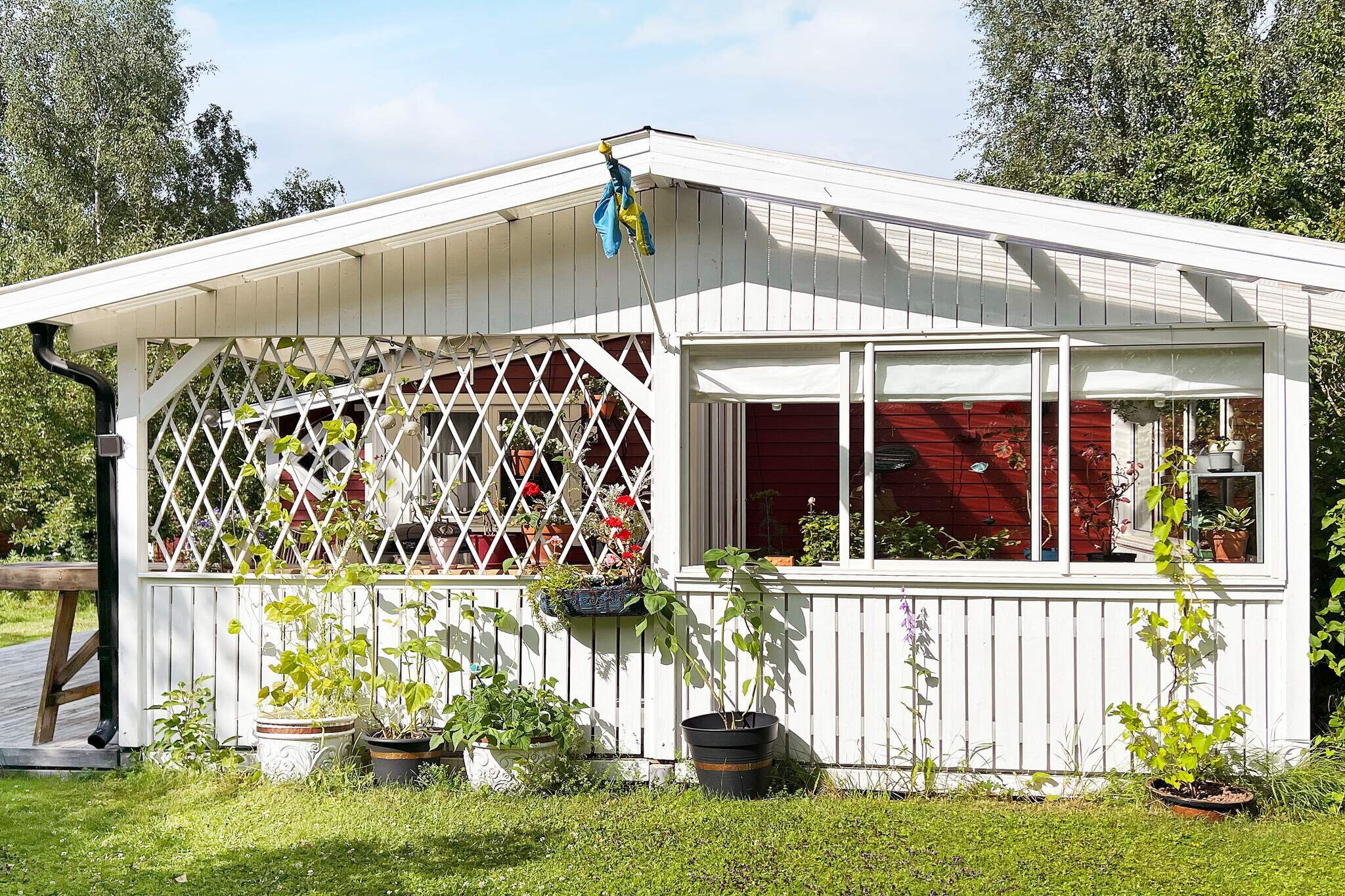 Annex: (shower(reachable from the outside), toilet(reachable from the outside))\n\nAnnex: (2x single bed, microwave, fridge)\n\nKitchen(cooker(electric), hood, coffee machine, microwave, fridge(+ freezer), water from well), Living/bed room(double folding bed, DVD player), bedroom(single bed), conservatory, sauna(outside, 6 persons), heating(electric), terrace(garden furniture), terrace(roofed), garden, parking