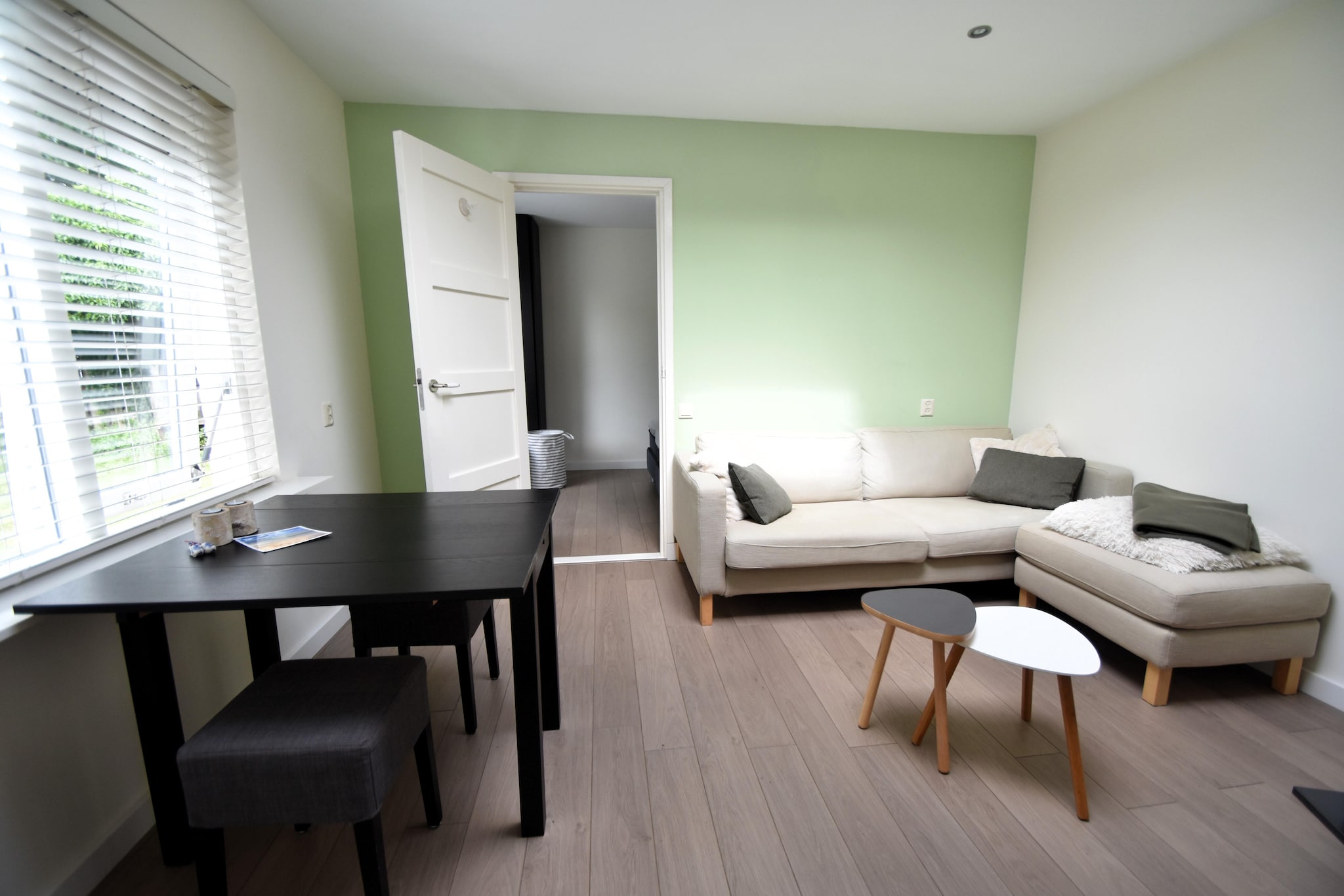 Tucked away in the peaceful village of Huisduinen, this charming holiday home features a cozy living and dining area equipped with a smart TV, a gas stove for added warmth, and a well-appointed open kitchen including an oven, combination microwave, and coffee machine. The bedroom offers a flexible setup of either a double bed or two singles, complete with a private washbasin. The modern bathroom has a walk-in shower and toilet. It is ideal for 2 guests, especially couples seeking a romantic coastal escape. With cozy interiors and the North Sea just steps away, itâ€™s the perfect base for a serene seaside getaway. Guests also benefit from private parking and a peaceful, fenced garden shared with the friendly host.

Surrounded by history and nature, this location is ideal for exploring. Visit Fort Kijkduin (550 m), an impressive Napoleonic fortress housing an aquarium and museum. Nearby, Vuurtoren De Lange Jaap, one of the tallest lighthouses in Europe, offers striking views. The Atlantikwall Centrum, The former accommodation building of the German Navy in Huisduinen,  just 300 m away. For nature lovers, the Grafelijkheidsduinen is a peaceful dune west of Den Helder and it forms the northernmost dune area on the Dutch mainland, area perfect for hikes and birdwatching. When itâ€™s time to dine, head to Nogal Wiedus (260 m) for fresh seafood or enjoy beachside dining at Storm aan Zee (400 m) and Strandpaviljoen Factor 30 (1.6 km). For grocery needs, Albert Heijn is just a short drive away. Whether youâ€™re here to explore history, walk the beach, or simply relax, this cozy coastal home offers the perfect base.

Embrace the charm of coastal living with comfort and convenience at your doorstep. Your perfect getaway in Huisduinen awaits!
