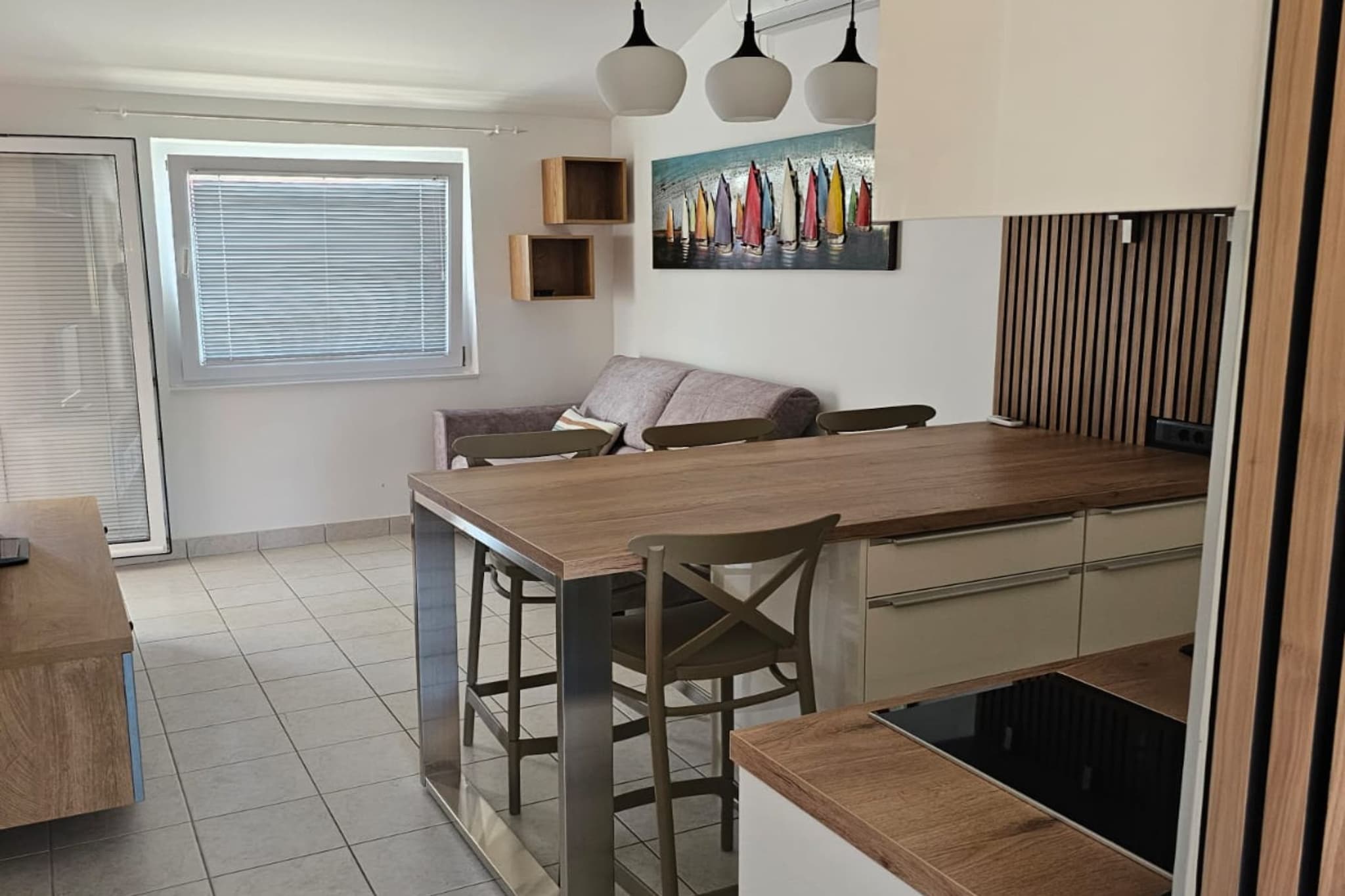 Apartment Furdi in Zaton, Zadar County, Croatia, offers comfortable accommodations with modern amenities such as free Wi-Fi, air conditioning, and a fully equipped kitchen. Located in the charming coastal village of Zaton, it provides easy access to nearby beaches and is a short drive from the historic city of Zadar. Ideal for families and couples, it's a great base for exploring the natural beauty and cultural attractions of the region.

Note:

Private parking is available, reservation is not required.
Wi-Fi is available throughout the property.
Pets are not allowed.

This two-bedroom apartment can accommodate up to four guests. It features a flat-screen TV and is combined with a living room seating area, sofa, and kitchen. The private bathroom is equipped with a shower and toilet.

Thanks to its excellent location, everything you'll need for your vacation is just a short walk away from the property. Grocery stores, cafes, restaurants—everything is within a 500 m radius. The beach is 50 m away from the property.

The airport is 25 km away from the property.
