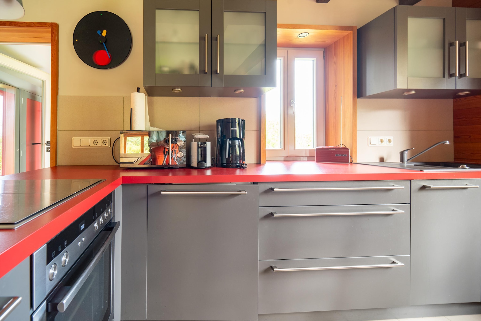 Ground floor: (Living room(floor heating)(single sofa bed, TV, fireplace, seating area), Kitchen(electric kettle, toaster, coffee machine, oven, microwave, dishwasher, fridge-freezer), bedroom(double bed), bedroom(double bed or 2 single beds), bathroom(shower, washbasin, toilet), storage(washing machine))\n\ngarden, garden furniture, BBQ, parking, Sunscreen