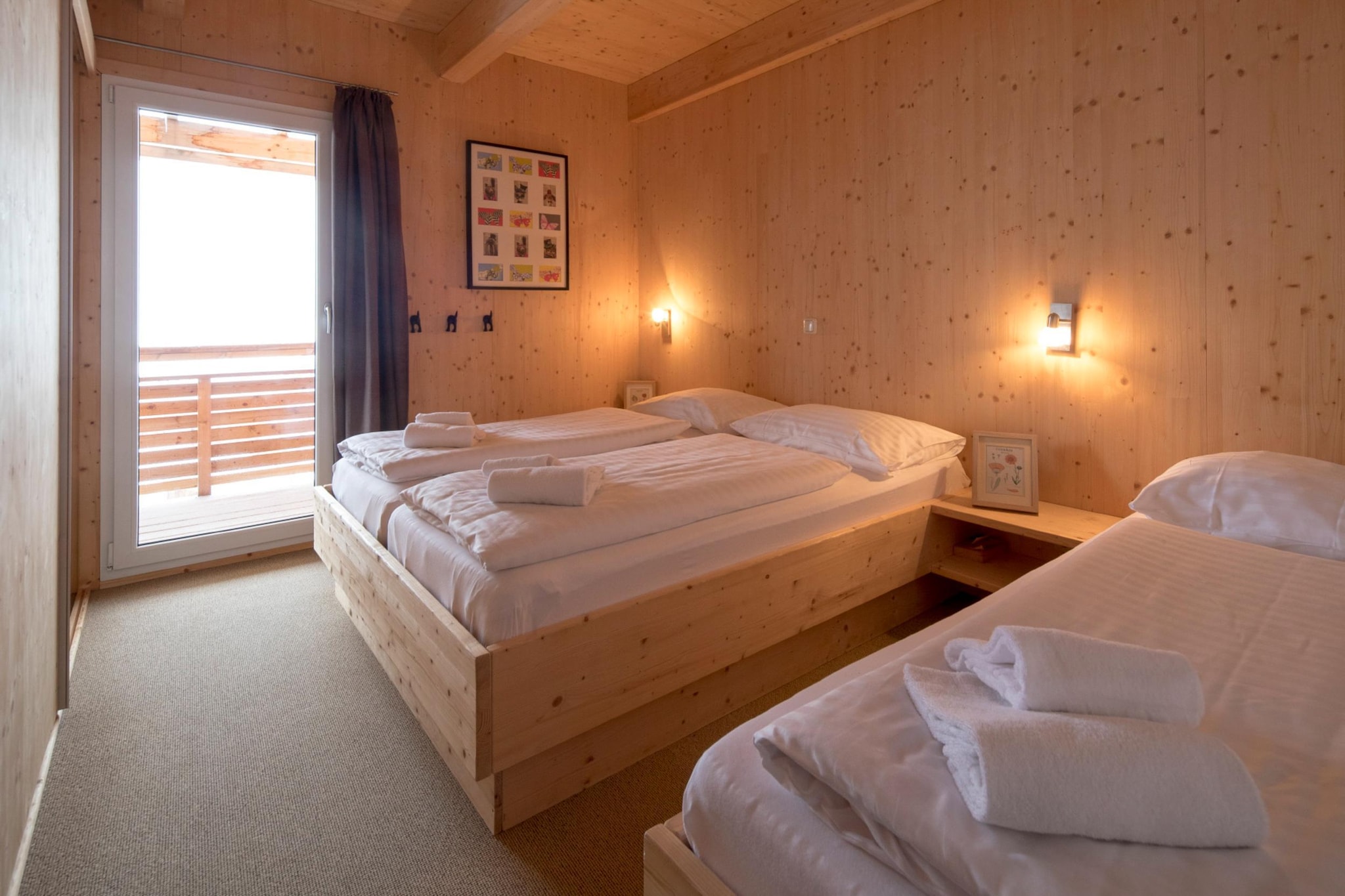 Ground floor: (Entrance, bedroom(bunk bed, bunk bed), bedroom(single bed, double bed, balcony), Bedroom with bathroom(double bed, shower, toilet, balcony, hairdryer), bathroom(Bubble bath, shower, infrared sauna, washbasin, toilet), Internet access)\n\nOn the 1st floor: (Living room(TV(satellite), dining table, fireplace, seating area, DVD player), open kitchen(hob(4 ring stoves, ceramic), electric kettle, toaster, coffee machine(espresso, filter), oven, microwave, dishwasher, fridge-freezer), Bedroom with bathroom(double bed, shower, toilet, balcony))\n\nwashing machine, balcony or terrace, heating(central), drying cabinet