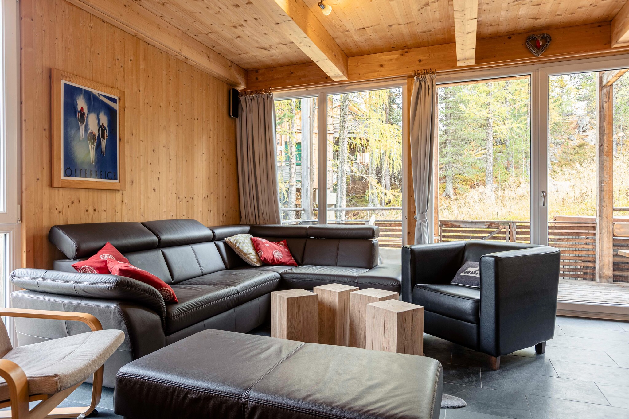 Discover the charm and comfort of this beautiful 110 mÂ² wooden chalet, perfectly designed to accommodate up to 8 guests. Nestled in a tranquil pine forest 1,800 meters above sea level, this inviting retreat offers a blend of rustic elegance and modern convenience, ideal for both relaxation and adventure. End your day in blissful relaxation with the chaletâ€™s infrared sauna or unwind in the outdoor whirlpool, offering a perfect retreat after a day of activities.   

Located just 1 km from the center, 1.5 km from the ski slope, and only 100 meters from the forest, the chalet offers easy access to a range of outdoor activities, including cycling and hiking. 

The chalet features four well-appointed bedrooms: two with cozy double beds and two with comfortable bunk beds, providing flexible sleeping arrangements for families or groups. With two stylish bathrooms, each equipped with a shower, thereâ€™s ample space for everyone to refresh after a day of exploring. Step out onto the balcony to be captivated by the mesmerizing views of the surrounding landscape. The open kitchen is a culinary delight, fully equipped with cutlery, cookware, a ceramic hob, oven, dishwasher, and a fridge with freezer compartment. Additional amenities include a toaster, kettle, and coffee machine. A small starter set of dishwasher tabs, dishwashing liquid, a sponge, garbage bags, cleaning supplies, and a tea towel will be provided for your convenience upon arrival. Stay connected with free Wi-Fi and enjoy your favorite shows on satellite TV. 

The Butler Card or Butler Programme is included, ensuring personalized service to enhance your stay. Experience a perfect blend of comfort, scenic beauty, and modern amenities in this charming wooden chalet, where every detail is designed to make your escape truly unforgettable.