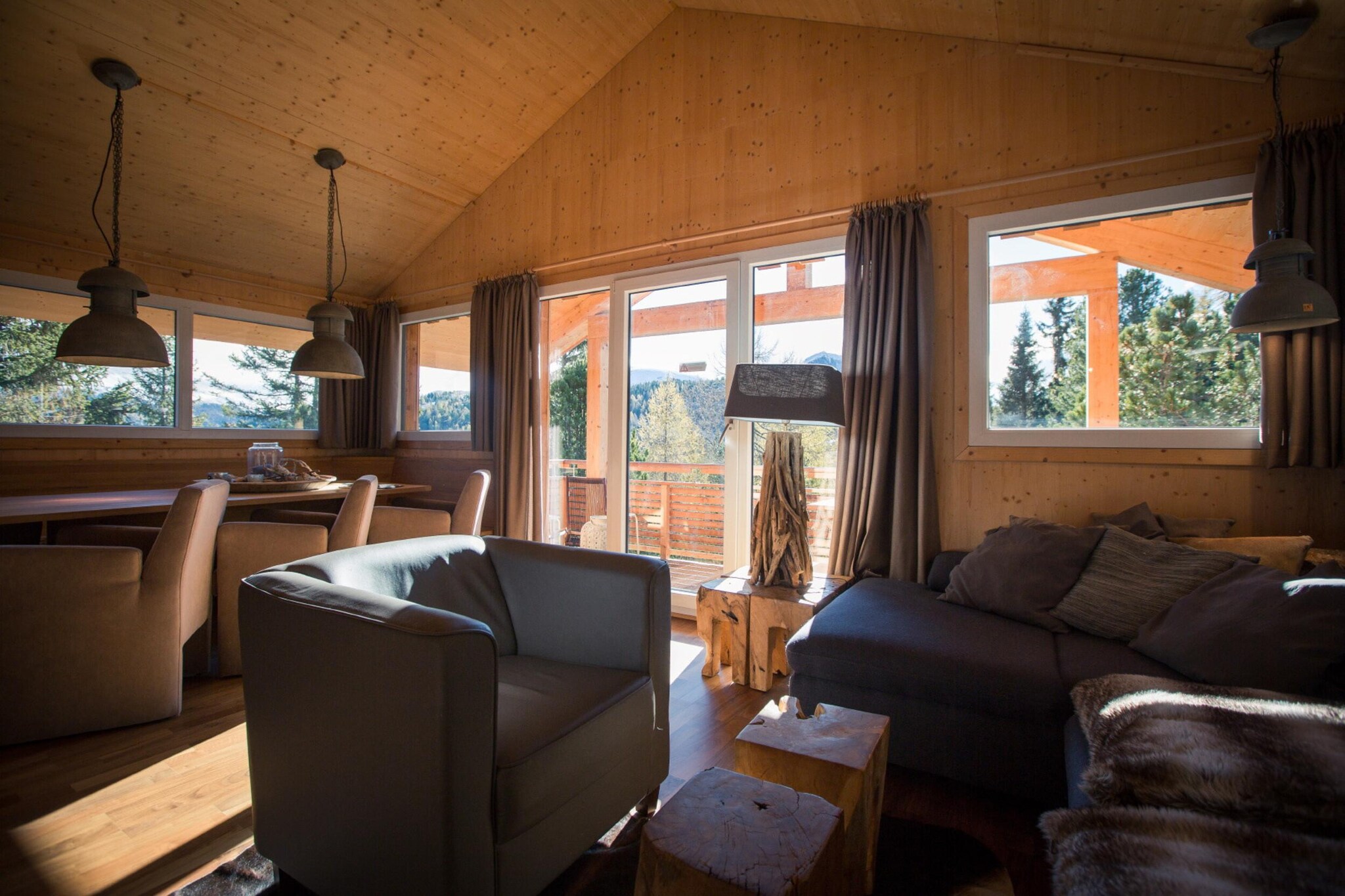 Welcome to this charming 130 mÂ² solid wood chalet, designed to comfortably accommodate up to 10 guests. Situated in a serene pine forest at an elevation of 1,800 meters, this delightful chalet offers the perfect blend of rustic appeal and modern amenities for a memorable mountain escape.  

Conveniently located just 1 km from the ski resort, this chalet offers easy access to skiing, hiking, cycling, and walking in the beautiful surrounding landscape. 

The chalet features four inviting bedrooms: three with cozy double beds and one with bunk beds, making it ideal for families or groups. With three well-appointed bathrooms, each equipped with a shower, you'll have ample space and convenience. Enjoy the fresh alpine air and stunning forest views from the spacious balcony. After a day of adventure, unwind in style with the chaletâ€™s premium amenities. The infrared sauna offers a relaxing retreat, while the whirlpool bathtub provides a luxurious way to soothe tired muscles. The open-plan kitchen is fully equipped to cater to all your culinary needs, including a ceramic hob, oven, dishwasher, and a fridge with a freezer compartment. Essential small appliances such as a toaster, kettle, and coffee machine are also provided. To ensure a smooth start to your stay, a small starter set will be ready upon arrival, including dishwasher tabs, dishwashing liquid (sample), a sponge, garbage bags, cleaning supplies, and a tea towel. Stay connected with free Wi-Fi and enjoy a variety of channels on satellite TV.  

 Enhance your stay with our Butler card or Butler programme, which provides personalized service and exceptional assistance throughout your visit.