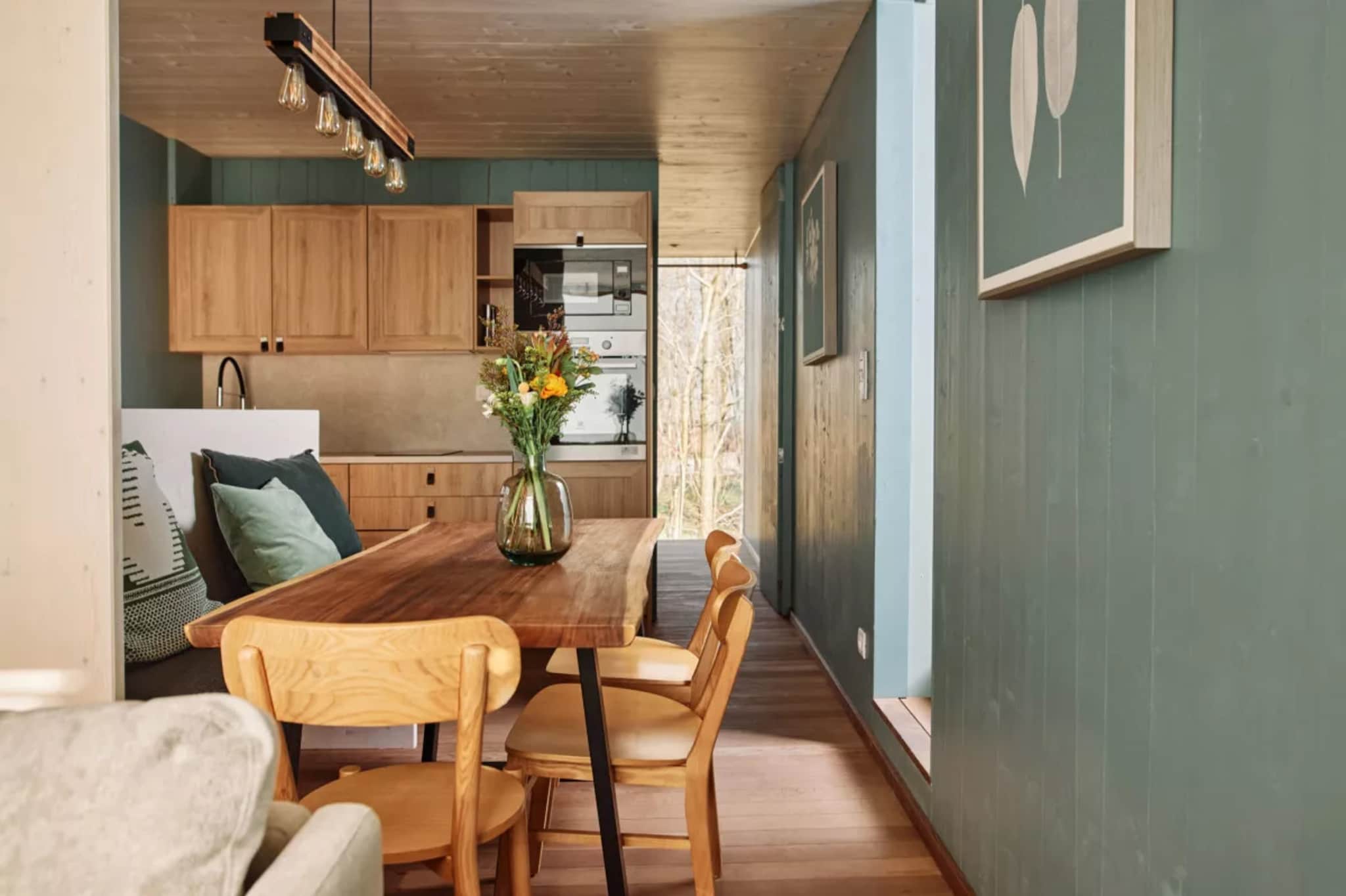 Ground floor: (Internet access, terrace)\n\nOn the 1st floor: (open kitchen(electric kettle, cooker, coffee machine(pads), oven, combination microwave, dishwasher, fridge-freezer), Living/diningroom(TV(smart TV), dining table, fireplace, seating area), bedroom(double bed(160 x 200 cm)), bathroom(shower, sauna, washbasin, toilet))\n\nOn the 2nd floor: (sleeping niche(double sofa bed(160 x 200 cm)), roof terrace, roof terrace, lounge set, lounge set)\n\nstorage(bicycles available), parking, swimming pool(shared with other guests)