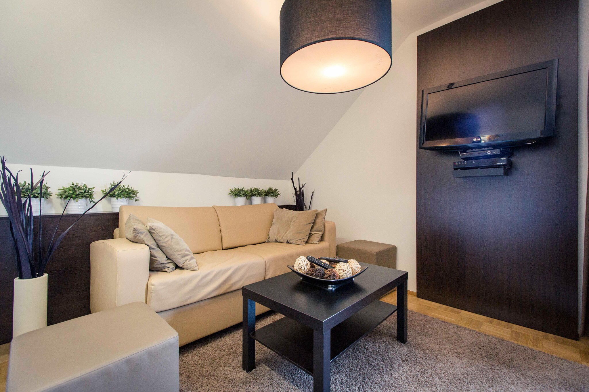 On the 1st floor: (Living room(TV(satellite), dining table, seating area), open kitchen(hob(4 ring stoves, ceramic), electric kettle, toaster, coffee machine(filter), fridge-freezer, fridge-freezer), bedroom(double bed), bedroom(bunk bed), bathroom(bath tub, shower, washbasin, toilet), Internet access)\n\nbalcony or terrace, heating(central), garden furniture