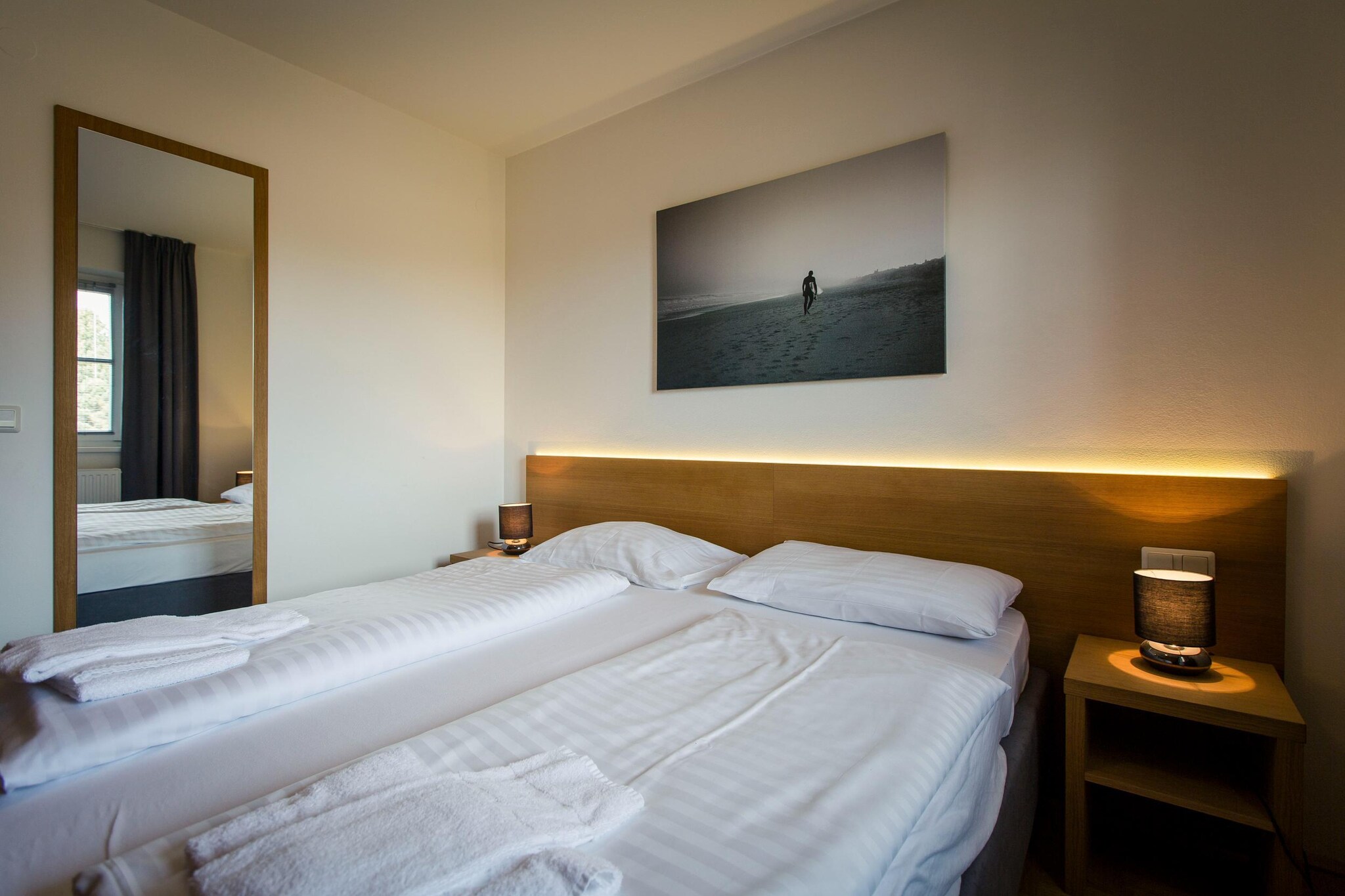 On the 1st floor: (hallway, Living room(TV(satellite), dining table, seating area), Kitchen(hob(4 ring stoves, ceramic), electric kettle, toaster, coffee machine(filter), dishwasher, fridge-freezer), bedroom(double bed), bedroom(bunk bed), bathroom(bath tub, shower, washbasin, toilet), Internet access, balcony, heating(central))\n\ngarden furniture