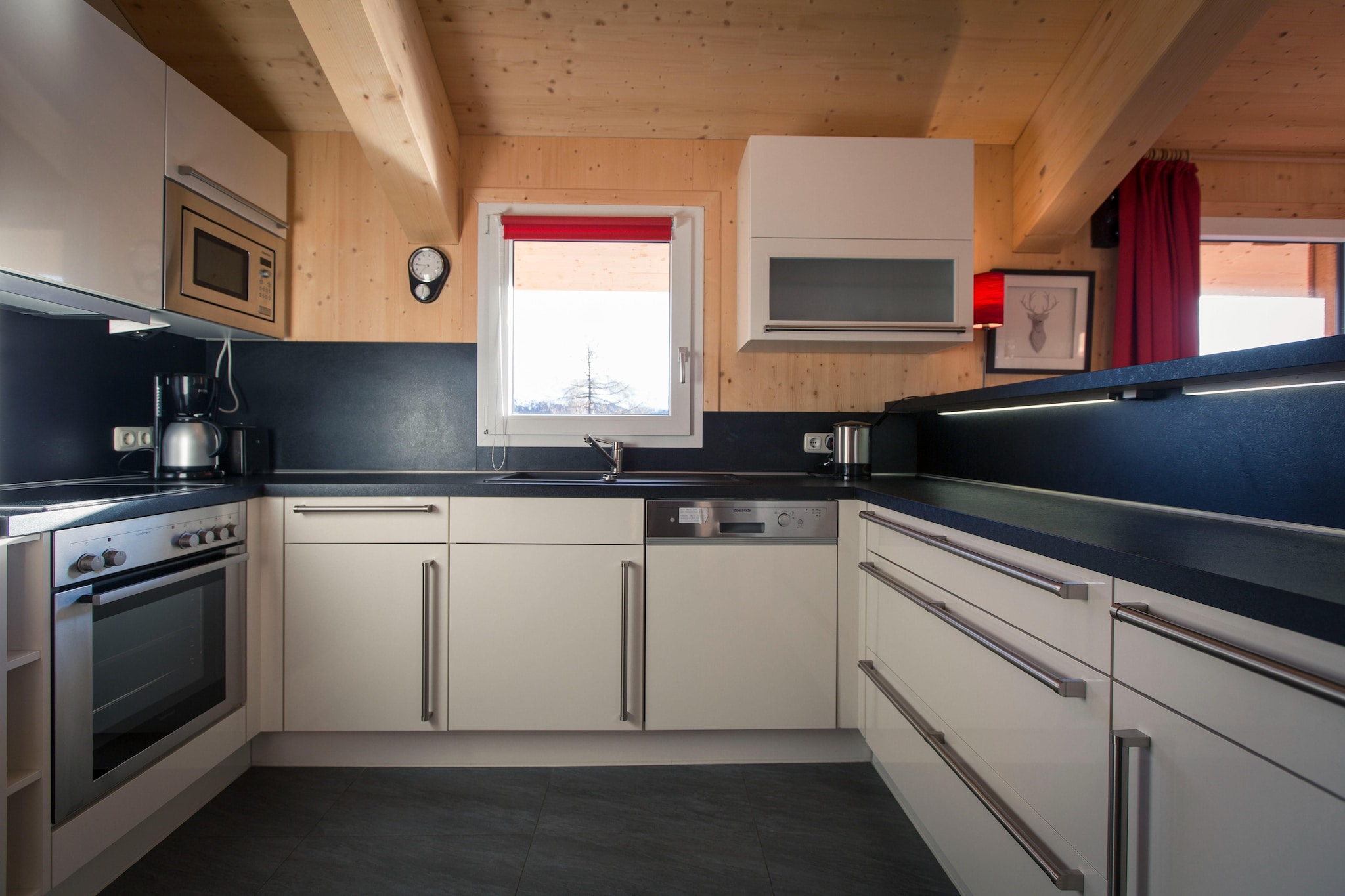 Ground floor: (Entrance, bedroom(single bed, single bed), bedroom(double bed, bunk bed, balcony), Bedroom with bathroom(double bed, shower, toilet, balcony), bathroom(hot tub, shower, infrared sauna, toilet, hairdryer), Internet access)\n\nOn the 1st floor: (Living room(TV, dining table, fireplace, seating area, DVD player), open kitchen(hob(4 ring stoves, ceramic), electric kettle, toaster, coffee machine(filter), dishwasher, fridge-freezer), bedroom(double bed), bathroom(shower, toilet), balcony)\n\nwashing machine, ski boot heaters, heating(central), garden furniture, drying cabinet