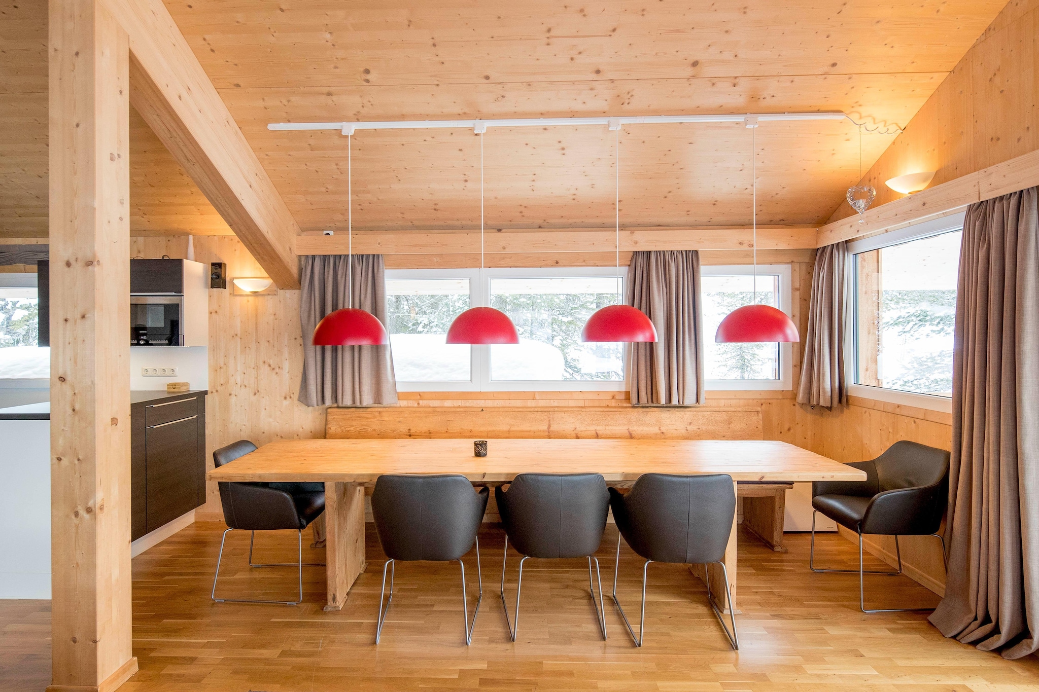 Ground floor: (Entrance, bedroom(single bed, single bed), bedroom(double bed), bedroom(bunk bed, bunk bed), Bedroom with bathroom(double bed, shower, infrared sauna, toilet, balcony), bathroom(hot tub, shower, sauna, toilet, hairdryer), bathroom(shower, toilet), Internet access)\n\nOn the 1st floor: (Living room(TV(satellite), dining table, fireplace, seating area, DVD player), open kitchen(hob(4 ring stoves, ceramic), electric kettle, toaster, coffee machine(espresso, filter), oven, microwave, dishwasher, fridge-freezer), bedroom(double bed), bathroom(bath tub, shower, toilet), balcony)\n\ntumble dryer, washing machine, ski boot heaters, heating(central), garden furniture, drying cabinet
