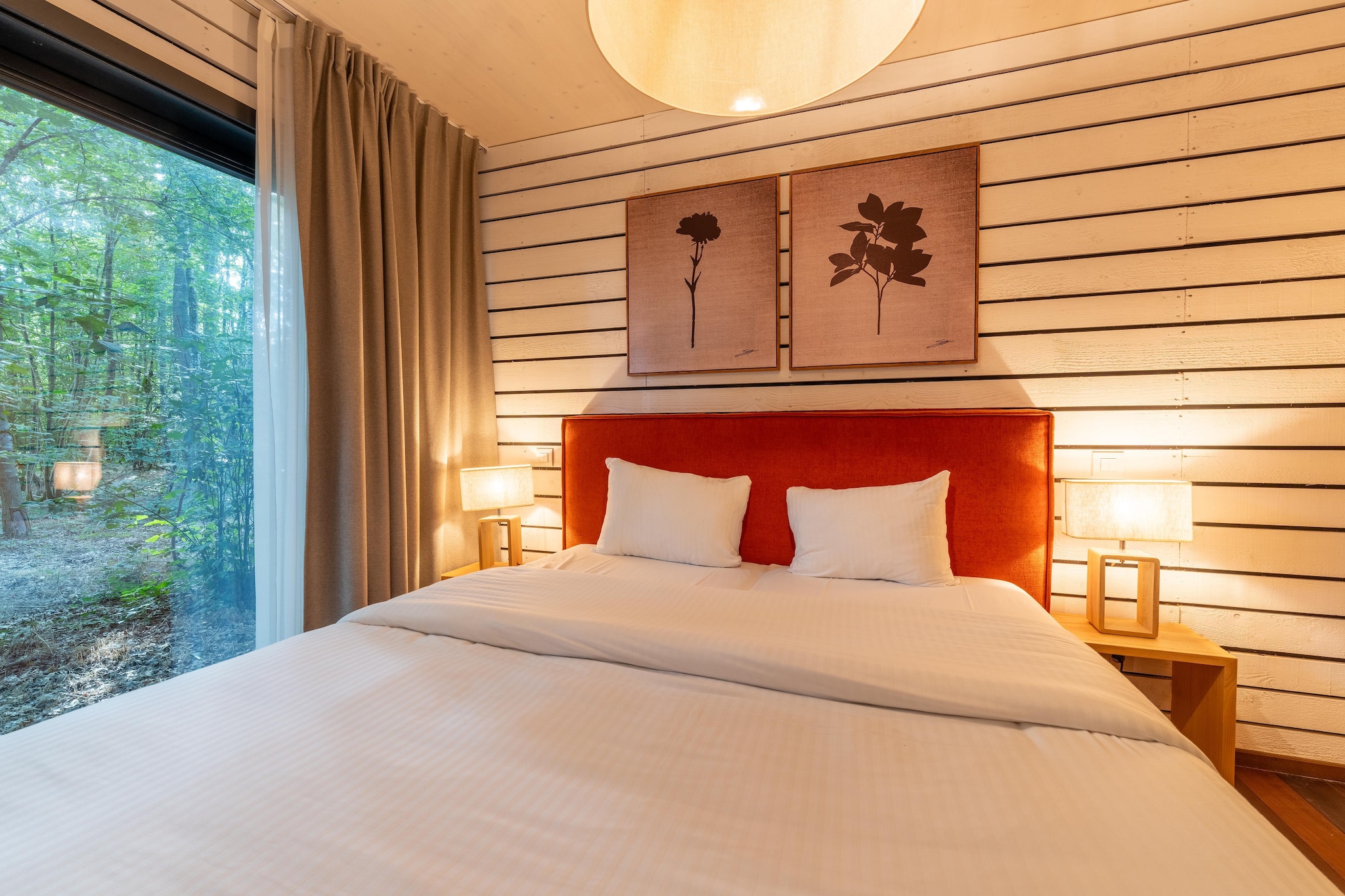 Ground floor: (Bedroom with bathroom(double bed(160 x 200 cm), shower, washbasin, toilet), Internet access)\n\nmezzanine: (open kitchen(electric kettle, cooker, coffee machine(pads), oven, dishwasher, fridge-freezer), Living/diningroom(double bed(160 x 200 cm), TV(smart TV), dining table, fireplace, seating area), terrace)\n\nterrace, garden, bicycle storage, garden furniture, parking lot(public), swimming pool(shared with other guests, outside), swimming pool(shared with other guests, indoor), padel court