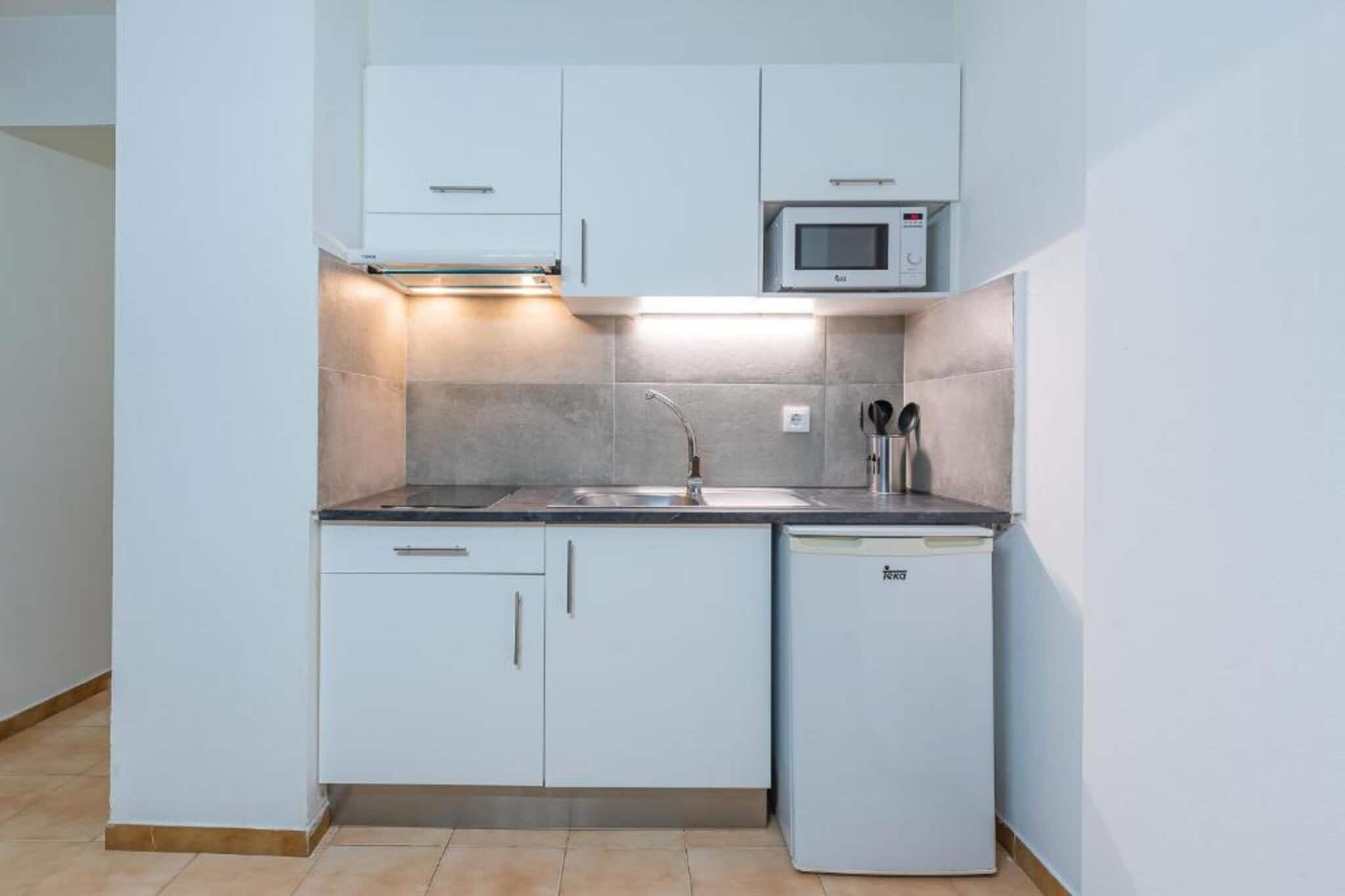APARTAMENTOS COMTE D'EMPURIES C46-Cuisine
