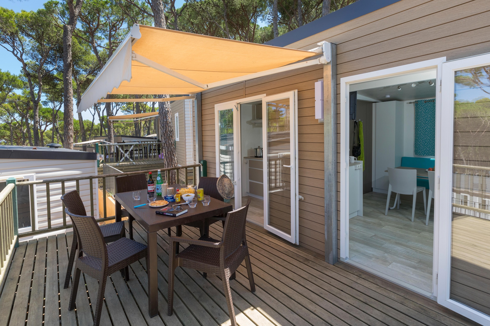 Living room(single sofa bed, TV, dining table), open kitchen(electric kettle, toaster, coffee machine, microwave, fridge-freezer), bedroom(double bed), bedroom(single bed, single bed), bathroom(shower, washbasin, toilet), air conditioning, garden furniture, parking, swimming pool(shared with other guests)