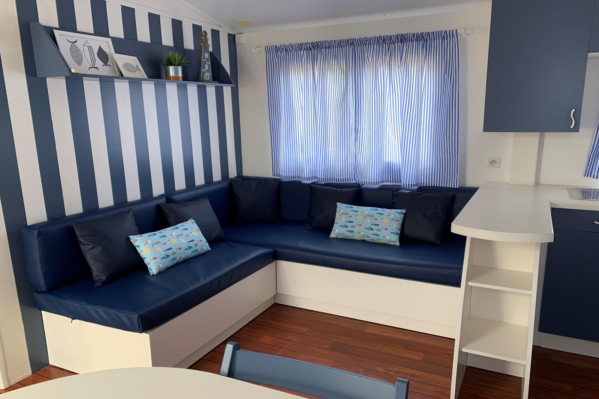 Cozy Coastal Escape with Comfort & Charm
Welcome to your sun-drenched holiday retreat in Malgrat de Mar! This modern mobile home offers a serene setting with a king-sized bed in the main bedroom and two cozy single beds in the second—ideal for families or small groups. The bright living room and well-equipped kitchenette with a fridge and coffee machine ensure all the comforts of home. Step outside onto your private terrace and enjoy the warm Mediterranean breeze while preparing delicious meals at one of the two outdoor barbecues.
Prime Location by the Beach & Attractions
Just a short walk from the golden sands of Malgrat de Mar, you can spend your days basking in the sun, swimming, or trying exciting water sports. Stroll into town to explore its quaint boutiques, vibrant local markets, and traditional restaurants serving fresh Catalan fare. For a dose of nature and views, visit Parc del Castell, or venture to nearby Blanes and Lloret de Mar for thrilling water parks and lively nightlife.
Peaceful Retreat with Practical Perks
Unwind in comfort with air conditioning and free Wi-Fi, and enjoy the convenience of private parking. Whether you're sipping coffee on the terrace or watching the stars after dinner, this charming mobile home offers everything needed for a relaxing getaway.