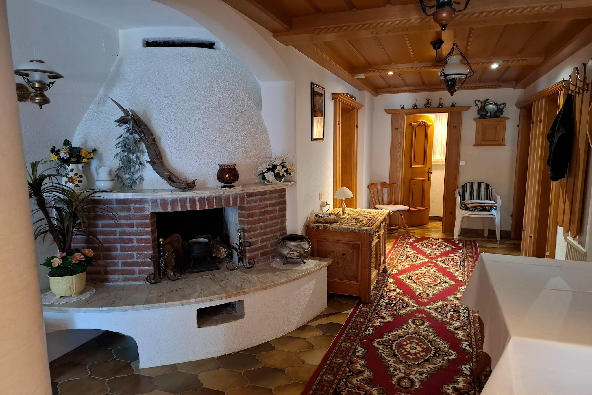 The property, along with its welcoming ambiance, offers a spacious holiday home that can accommodate up to 8 guests. It includes multiple bedrooms with comfortable beds, including a room with three beds, a shower, toilet, and washbasin, as well as another room with a shower and washbasin. A cozy living room with a sofa provides added relaxation, while a balcony offers a delightful space to enjoy the surrounding views. The property is pet-friendly, allowing one pet, making it a great choice for animal lovers. Free Wi-Fi is available throughout the property, and guests can take advantage of amenities like a ski boot dryer and a bread roll service for added convenience. Outdoor spaces are perfect for barbecues, and parking is also available on-site.  

Situated in a serene area, the property is ideally located near numerous attractions for all interests. A ski bus stop is conveniently located just 70 meters from the house, and guests can also use the free bus service throughout the valley, making it easy to explore. The property is only 1.5 km from the town center, while the renowned ski resort of Ischgl is just 10 km away. The Dias cable car is located 2.5 km from the property, providing quick access to the slopes, and a shopping center nearby ensures that groceries and other essentials are within easy reach.

The property features a fully equipped kitchen with modern appliances such as a fridge, oven, and stove, making it easy for guests to prepare their meals during their stay. A comfortable dining area is available for shared meals, and the living room offers a cozy setting for downtime.