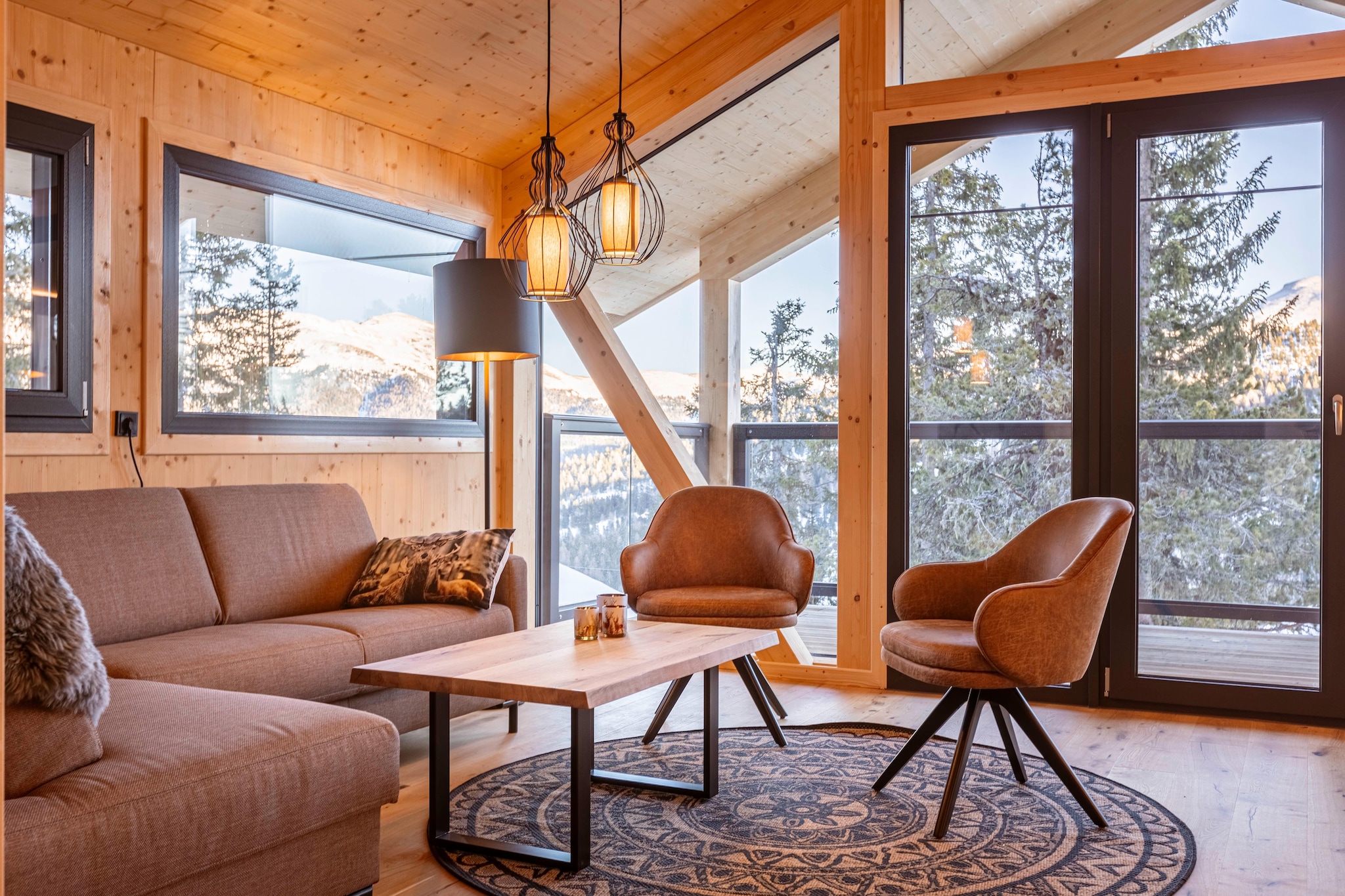 This delightful solid wood chalet, spanning 135 mÂ² across two floors, comfortably accommodates up to 8 guests. The chalet features four charming bedrooms: one on the ground floor with a double bed, en suite bathroom, and TV; two additional ground-floor bedrooms each with a double bed and TV; and a spacious upstairs bedroom with a double bed and a separate double bed, complemented by a bathroom with a bathtub. Relax and unwind in the Finnish sauna indoors or take in the scenic views from the hot tub on the balcony, which offers a serene setting without a whirlpool function.  

 Turracher HÃ¶he offers a range of activities year-round. In winter, itâ€™s a popular ski resort with well-maintained slopes, cross-country trails, and opportunities for snowboarding and tobogganing. In the summer, the area transforms into a hiking and biking paradise with picturesque trails and breathtaking mountain views. 

The open kitchen is fully equipped with everything you need, including cutlery, cookware, a ceramic hob, oven, microwave, dishwasher, and fridge with freezer compartment, as well as a toaster, kettle, filter coffee machine, and Nespresso capsule coffee machine. A small starter set, including dishwasher tabs, dishwashing liquid, sponge, garbage bags, cleaning supplies, and a tea towel, will be provided upon your arrival. Additional amenities include free Wi-Fi, TV, a butler card (details available on-site), and a ski boot dryer. 

 Access to the chalet is via an asphalted main road, followed by a picturesque forest and woodland path leading to your welcoming vacation home.