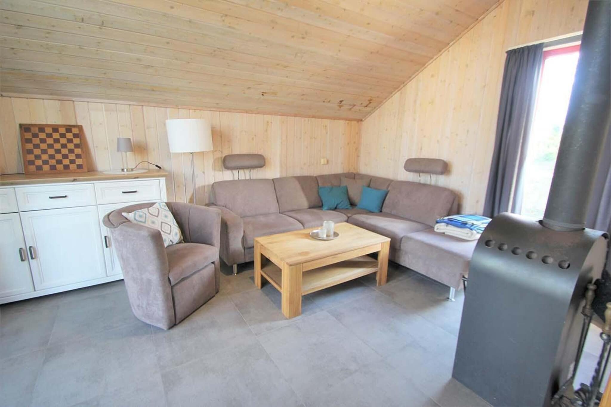 FH Wildgans Comfort mit Sauna & Kaminofen 81 qm 26-Woonkamer