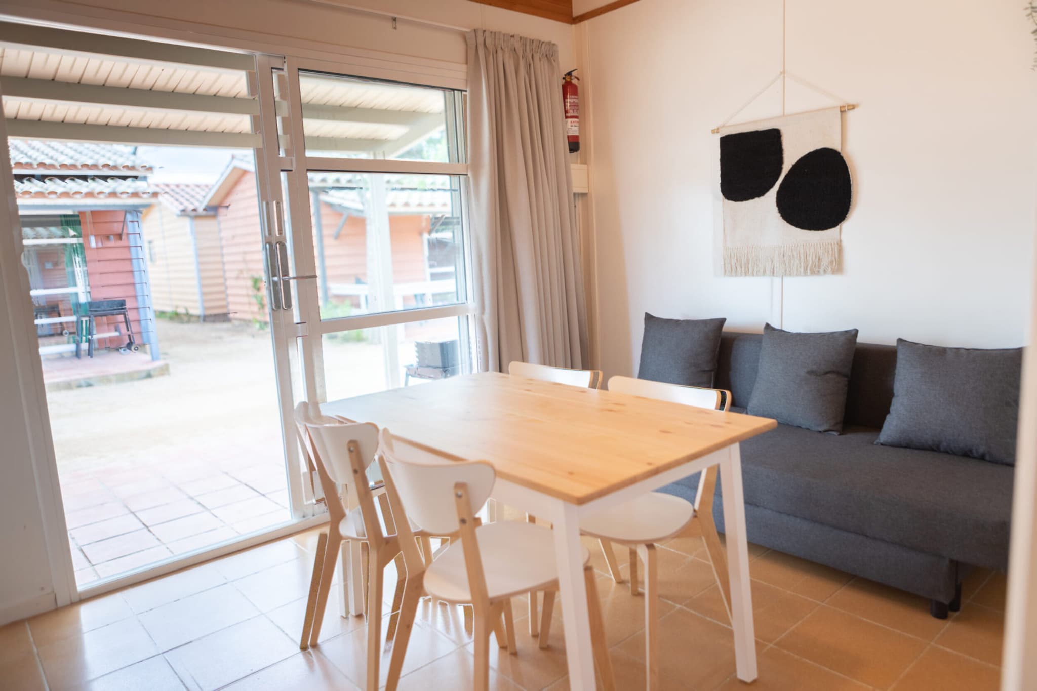Escape to this delightful 27 m² bungalow, perfectly suited for families or small groups. Featuring two cozy bedrooms, this bungalow offers a welcoming space for relaxation. The equipped kitchen provides all the essentials for preparing meals, while the covered terrace with a barbecue invites you to enjoy alfresco dining under the sun.
Just a short distance away, the beautiful beaches of Malgrat de Mar await, offering golden sands and crystal-clear waters. Explore the charming promenade lined with shops, cafes, and restaurants, perfect for a leisurely stroll or enjoying local cuisine. For adventure seekers, the nearby coastal paths offer stunning views and opportunities for hiking and biking. Malgrat de Mar is rich in attractions, from its lively markets to historical sites like the Torre de les Creus. Whether you’re seeking relaxation on the beach or an active holiday filled with exploration, this bungalow is the perfect home base for your Mediterranean getaway!
Conveniently located next to your bungalow, you’ll find a designated parking space for easy access. The surrounding area is vibrant and family-friendly, with a nearby park that boasts a football court and a refreshing swimming pool, ideal for both fun and relaxation.