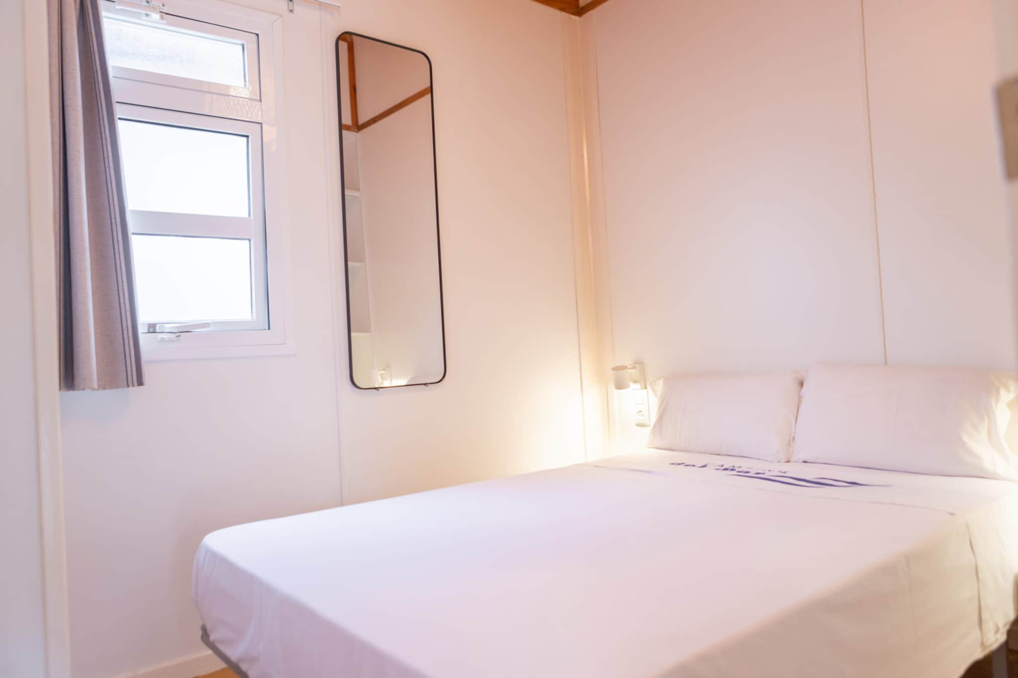 Ground floor: (Kitchen(coffee machine, microwave, fridge), Living/diningroom(double sofa bed, TV, seating area), bedroom(double bed), bedroom(single bed, single bed), bathroom(shower, washbasin, toilet))\n\nterrace, BBQ