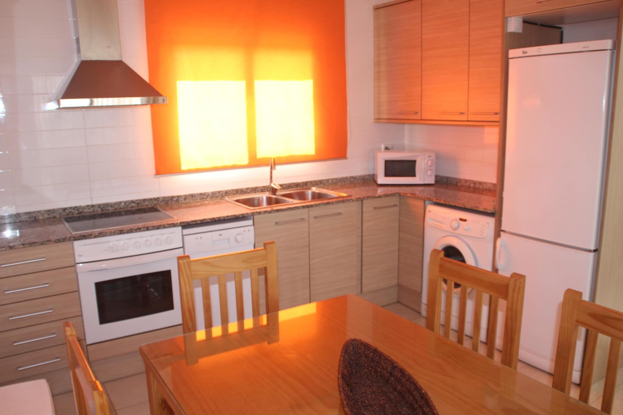 Kitchen(hob, oven, microwave, dishwasher, fridge), Living/diningroom(dining table, balcony or terrace), bedroom(double bed), bedroom(single bed, single bed), bathroom(bath tub, washbasin, toilet), Internet access, air conditioning, parking, swimming pool(shared with other guests)