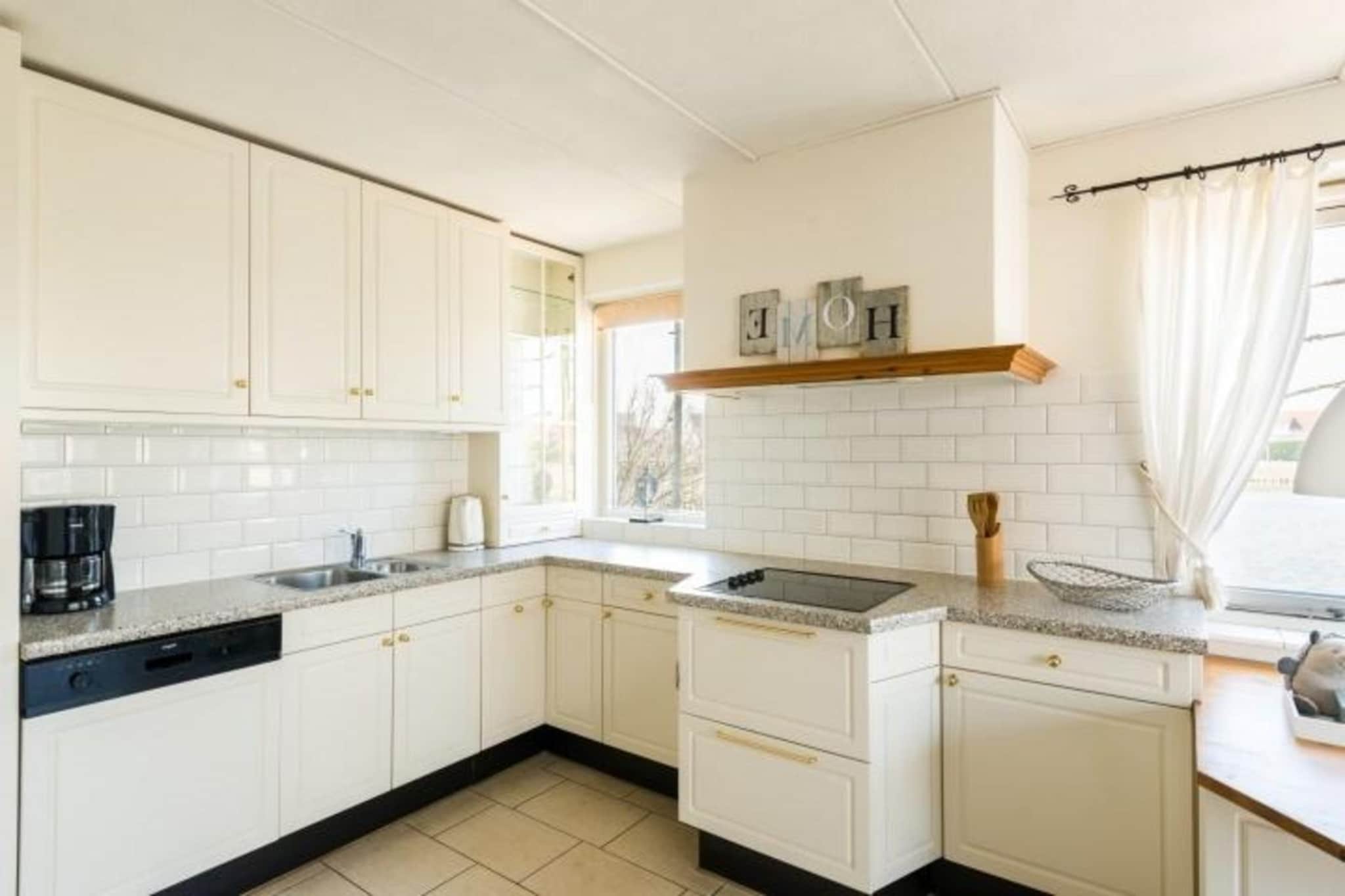 Ground floor: (Entrance, Living room(TV(flatscreen), dining table, seating area), open kitchen(hob(4 ring stoves, ceramic), electric kettle, hood, coffee machine(filter), microwave, dishwasher, fridge-freezer, dishes and cutlery(Bowls, chopsticks, plates, cups, etc.), Cooking basics), bedroom(double bed), bathroom(shower, washbasin, toilet), Internet access)\n\nOn the 1st floor: (bedroom(single bed, single bed), bedroom(single bed, single bed), bedroom(single bed, single bed), bathroom(bath tub, shower, washbasin, toilet))\n\ntumble dryer, washing machine, terrace, garden, garden furniture, sun loungers, parking, parking, heating