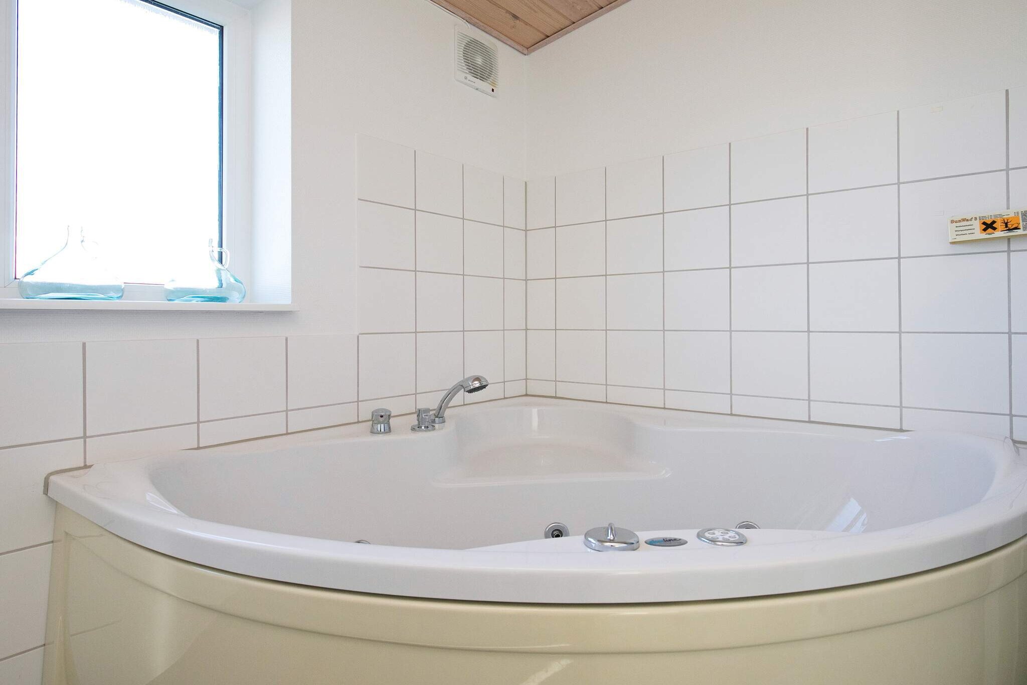 8 person holiday home on a holiday park in Løkken