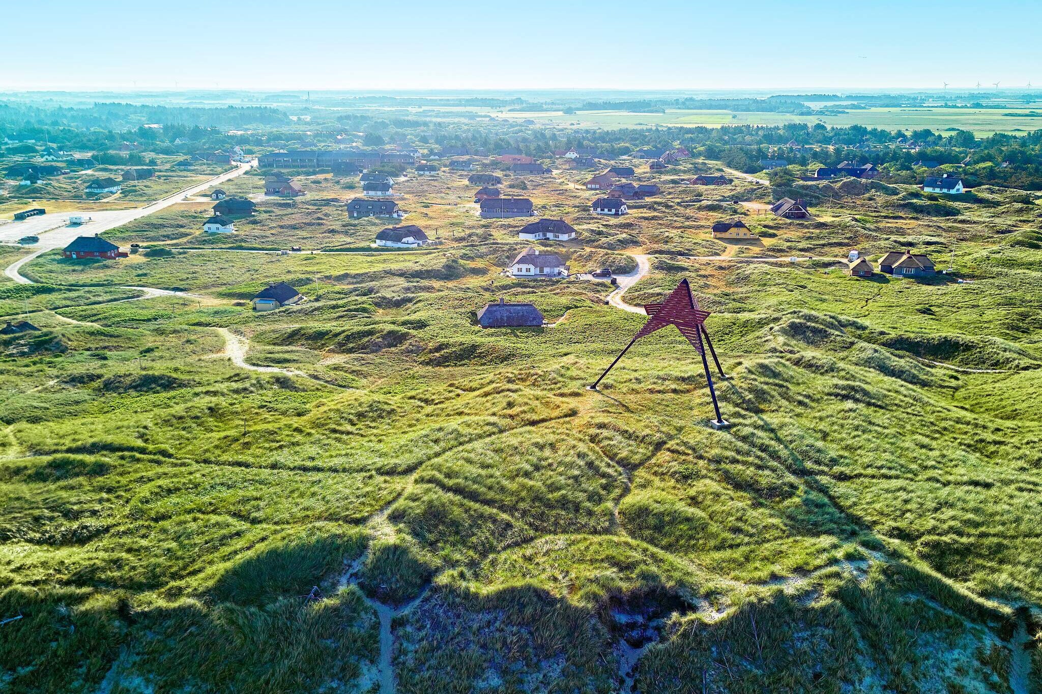 Kitchen(shared with other guests), Living/bed room(single folding bed, double bed, TV), bathroom(washbasin, shower, toilet), heating(electric), parking