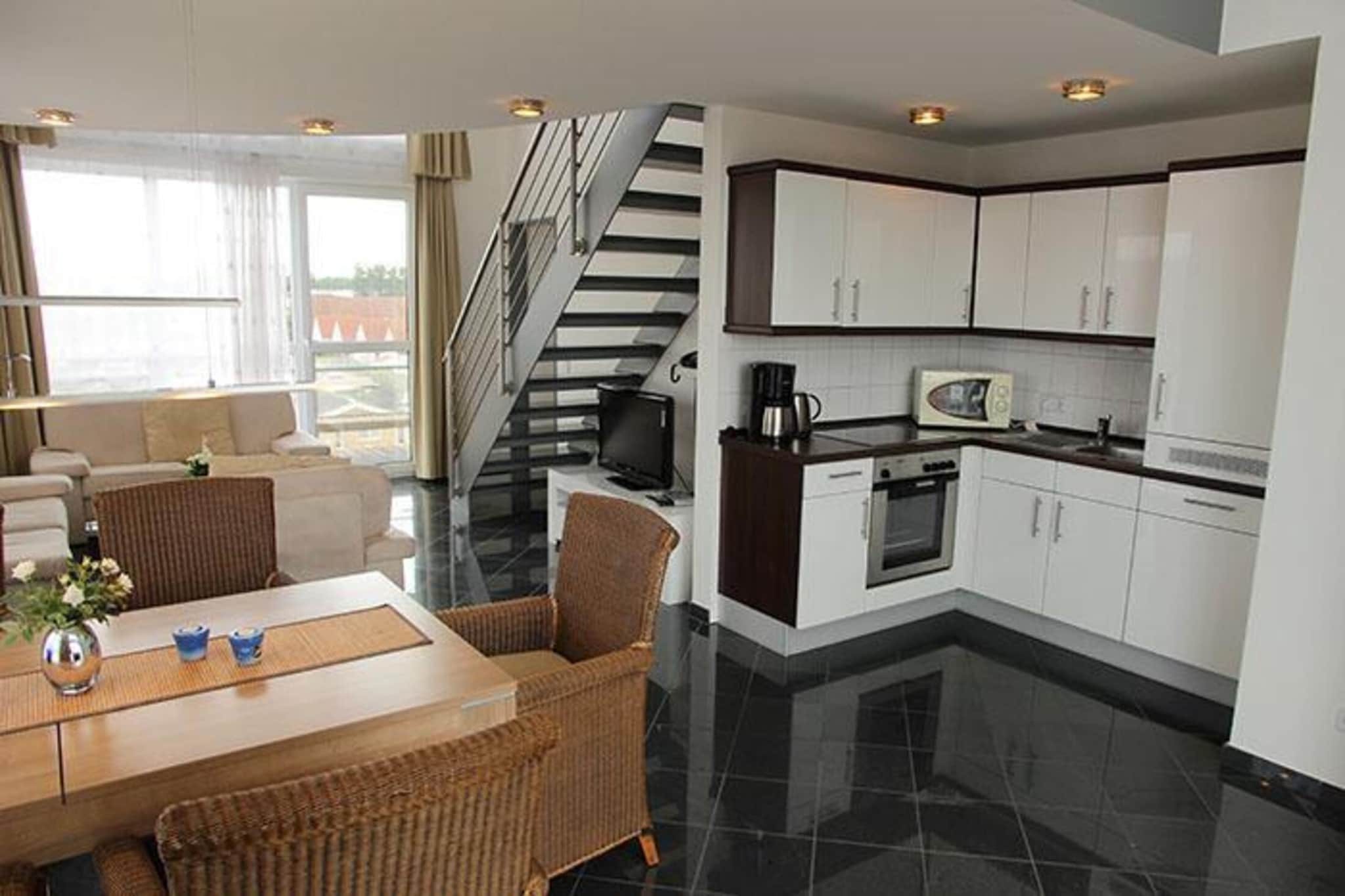 mezzanine: (mezzanine(single bed, double bed), Internet access)\n\nOn the 2nd floor: (open kitchen(electric kettle, toaster, cooker, coffee machine, oven, microwave, dishwasher, fridge-freezer), Living/diningroom(TV, dining table, seating area), bedroom(double bed), bathroom(shower, washbasin, toilet), bathroom(shower, washbasin, toilet))\n\nbalcony, heating(gas), garden furniture, parking, high chair, baby crib(paid), Towels/Sheets (Incl.)