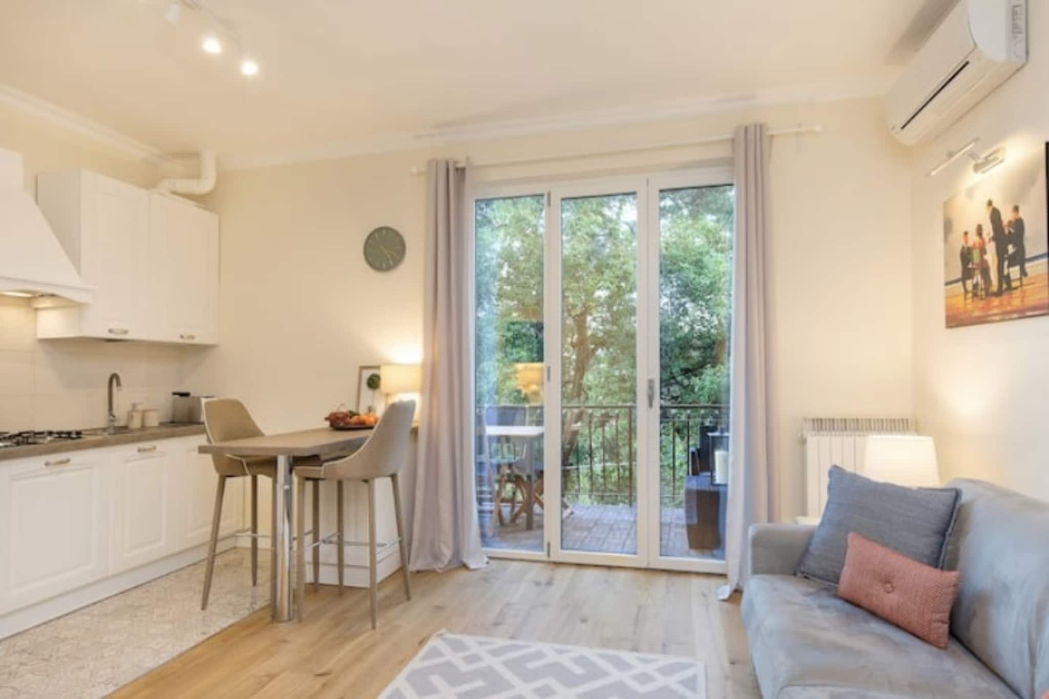 open kitchen(oven, dishwasher), Living/diningroom(TV), bedroom(double bed), bathroom(shower, washbasin, toilet), washing machine, balcony, heating(central), air conditioning, garden furniture