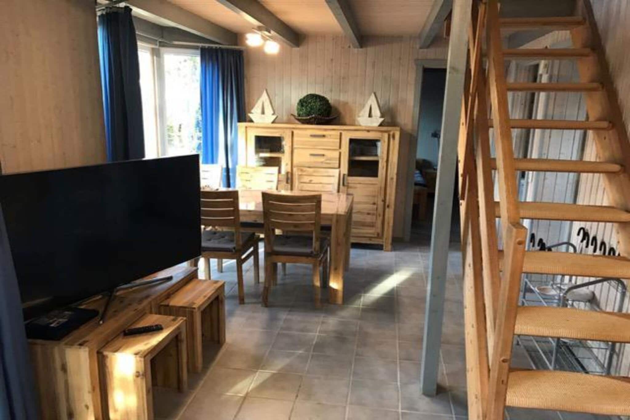 FH Wildgans Comfort mit Sauna & Kaminofen 81 qm 77-Woonkamer