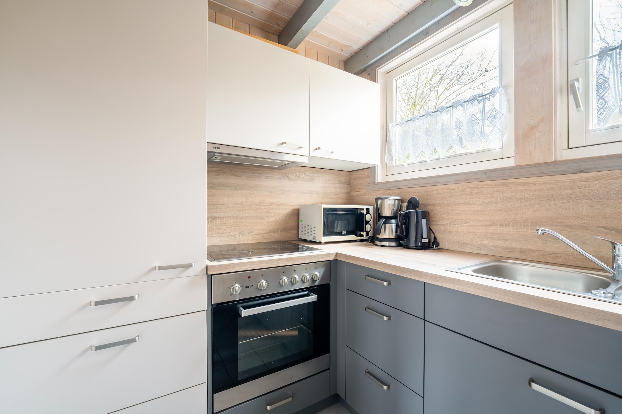 FH Wildgans Comfort mit Sauna & Kaminofen 81 qm 77-Keuken