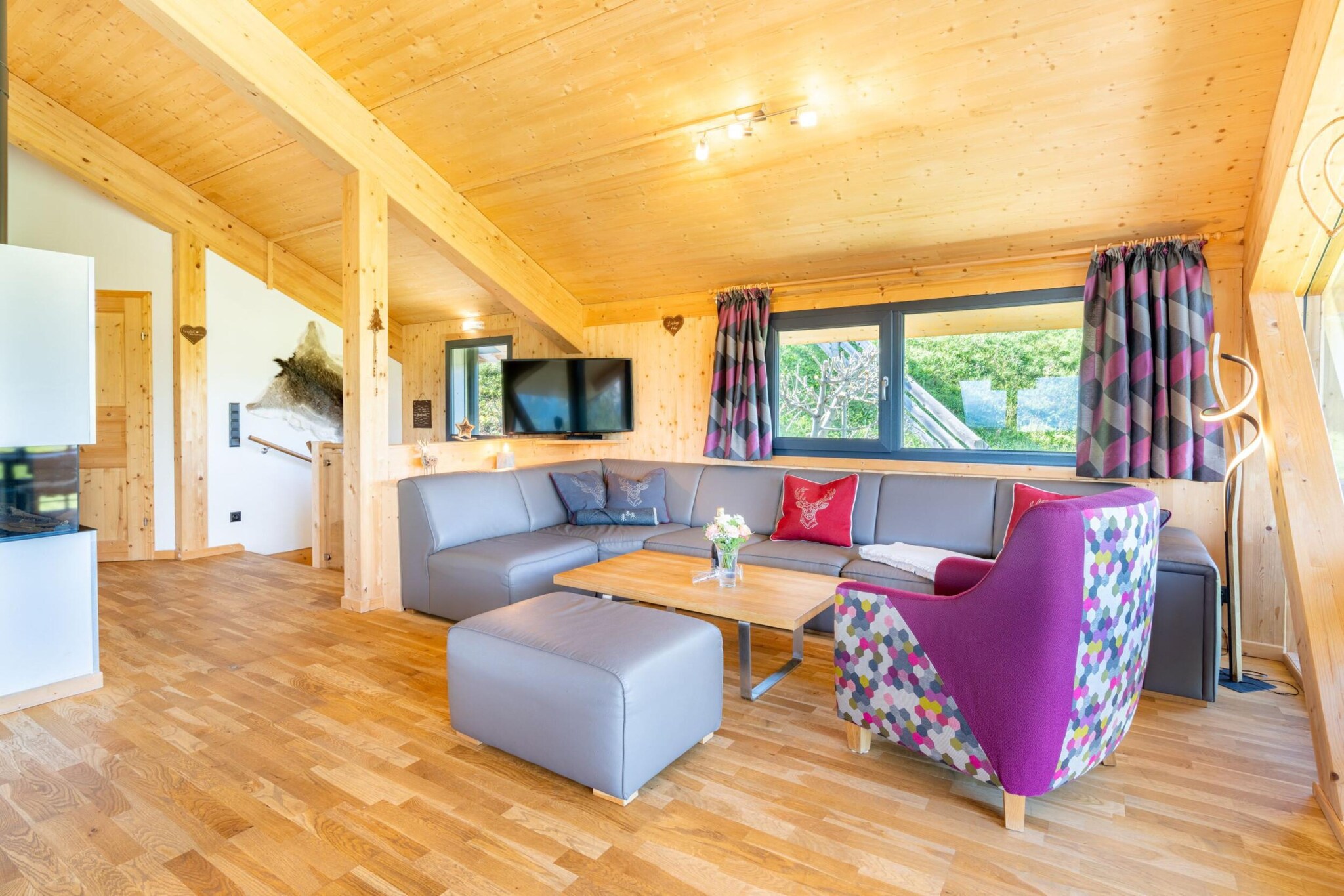 "Experience unparalleled comfort and breathtaking views at our Superior Chalet, offering a generous 120 m² of stylish living space designed to accommodate up to 10 guests. Nestled in the stunning Schladming-Dachstein region, this exceptional chalet is perfect for families or groups seeking a luxurious alpine retreat. Step outside onto one of the two balconies and take in the awe-inspiring views of the Dachstein, the iconic local mountain, and the Enns Valley below. 
This modern chalet is directly on the ski slope, offering ski-in/ski-out access in the winter and immediate access to hiking trails in the summer. 
The Superior Chalet boasts four beautifully appointed bedrooms, including three with comfortable double beds and one featuring two bunk beds, making it ideal for larger groups. Each of the four bathrooms is equipped with a modern shower, while an additional bathroom with a relaxing bathtub and Finnish sauna ensures ultimate relaxation and wellness. The open-plan kitchen is a chef's dream, fully equipped with top-of-the-line appliances including a ceramic hob, oven, dishwasher, and fridge with freezer compartment. Essential kitchen items such as cutlery, cookware, a toaster, kettle, and coffee machine are also provided. Upon arrival, you’ll find a small starter set with dishwasher tabs, dishwashing liquid, a sponge, garbage bags, a cleaning cloth, and a tea towel to make your stay more convenient. Additional amenities include free Wi-Fi and satellite TV, ensuring you stay connected and entertained throughout your stay. 
Please note that the chalet’s images are sample representations, as each property is individually decorated to offer a unique experience. The chalet includes a Schladming-Dachstein Summer Card (mid-May to early November), adding extra value to your stay.  "