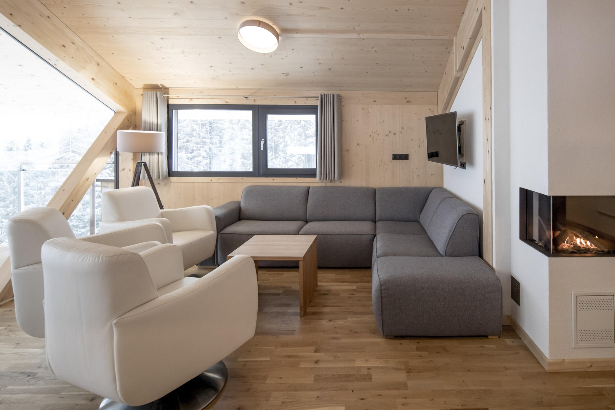 "Experience the pinnacle of alpine luxury at our Superior Chalet, offering a spacious 120 m² designed to accommodate up to 10 guests in style and comfort. Nestled in the picturesque Schladming-Dachstein region, this modern chalet combines elegant design with breathtaking natural beauty, making it an ideal retreat for families or groups. Step outside onto one of the two balconies and be captivated by the stunning views of the Dachstein mountain and the Enns Valley. Whether you're enjoying a winter wonderland or summer's warmth, these panoramic vistas will enhance your stay. 
Conveniently located directly on the ski slope, the chalet offers exceptional ski-in/ski-out access during the winter months. 
The Superior Chalet features four beautifully furnished bedrooms. Three of these bedrooms are equipped with comfortable double beds, while the fourth bedroom includes two bunk beds, perfect for children or extra guests. The chalet includes five bathrooms, with four featuring modern showers and one boasting a relaxing bathtub and a Finnish sauna for ultimate relaxation. The open-plan kitchen is a culinary delight, fully equipped with a ceramic hob, oven, dishwasher, and a fridge with a freezer compartment. It also includes essential kitchenware such as cutlery, cookware, a toaster, kettle, and coffee machine. To ensure a smooth start to your stay, a small starter set with dishwasher tabs, dishwashing liquid, a sponge, garbage bags, a cleaning cloth, and a tea towel will be provided. In the summer, you'll have immediate access to hiking trails. The property also provides free Wi-Fi and satellite TV for your entertainment. 
 Please note that all images are sample representations, as each chalet is uniquely decorated to offer a distinct and personalized experience. 
 There is a Schladming-Dachstein Summer Card (mid-May to early November) for added advantage.  "