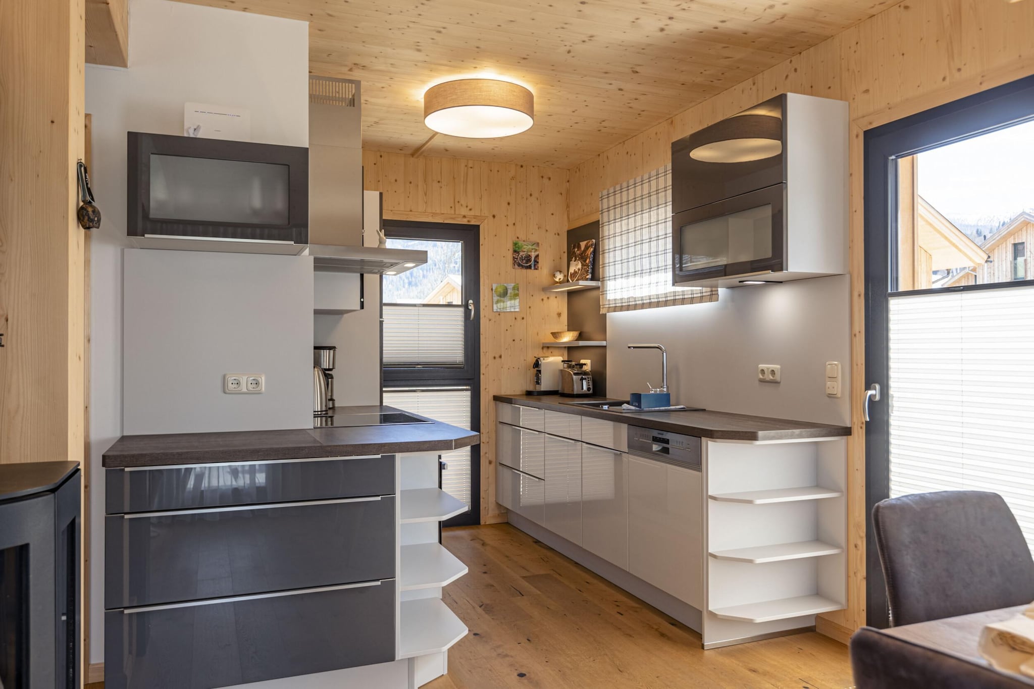 Ground floor: (Living room(TV(satellite), gas fireplace), open kitchen(electric kettle, toaster, cooker(4 ring stoves, ceramic), coffee machine(espresso, filter), oven, microwave, dishwasher, fridge-freezer), Internet access)\n\nOn the 1st floor: (bedroom(double bed), bedroom(double bed), bathroom(shower, sauna, washbasin, toilet, hairdryer))\n\ngrill, Bubble bath(outside), washing machine(shared with other guests, paid), heating(electric, central), terrace, garden furniture, BBQ, parking