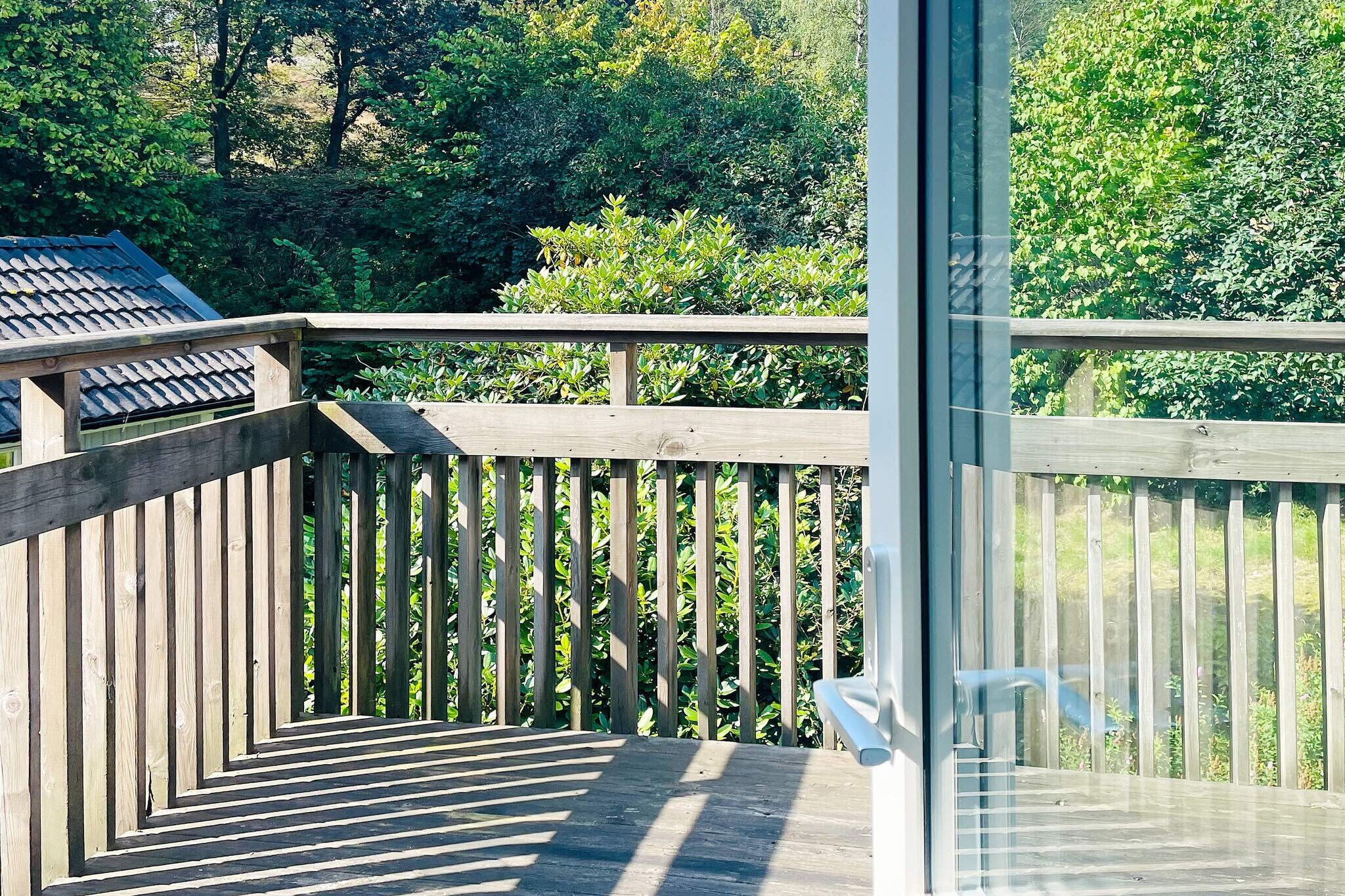 Kitchen(cooker(electric), microwave, fridge-freezer), Living/bed room, bedroom(double bed), bedroom(single bed), bedroom(single bed), bathroom(washbasin, shower, toilet), balcony, heating(electric), garden, garden furniture, garden furniture, parking, air to air heatpump