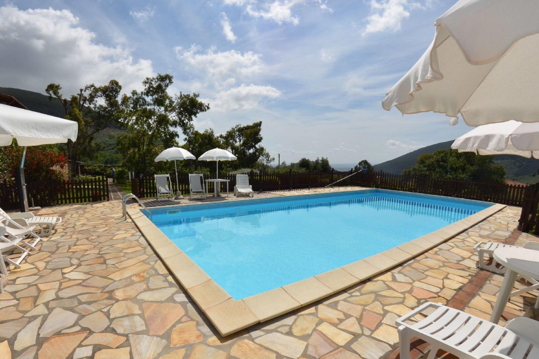 Ground floor: (open kitchen, Living/diningroom, bedroom(double bed), bedroom(bunk bed), bathroom, veranda)\n\nOn the 1st floor: (open kitchen, Living/diningroom, bedroom(double bed), bedroom(bunk bed), bathroom)\n\ngarden(shared with other guests), garden furniture, BBQ, parking, swimming pool(shared with other guests, 13 x 6 m., opened from 1/2 May upto and including 1/2 Sep)